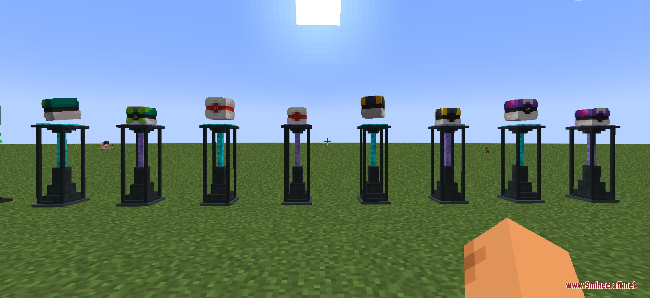 Cobblemon Pokestops Mod Screenshot 4 A row of colorful PokeStop stations stands on a flat grassy field