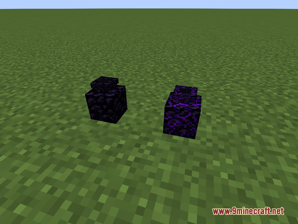 Obsidian and Crying Obsidian coin banks placed on the green grass