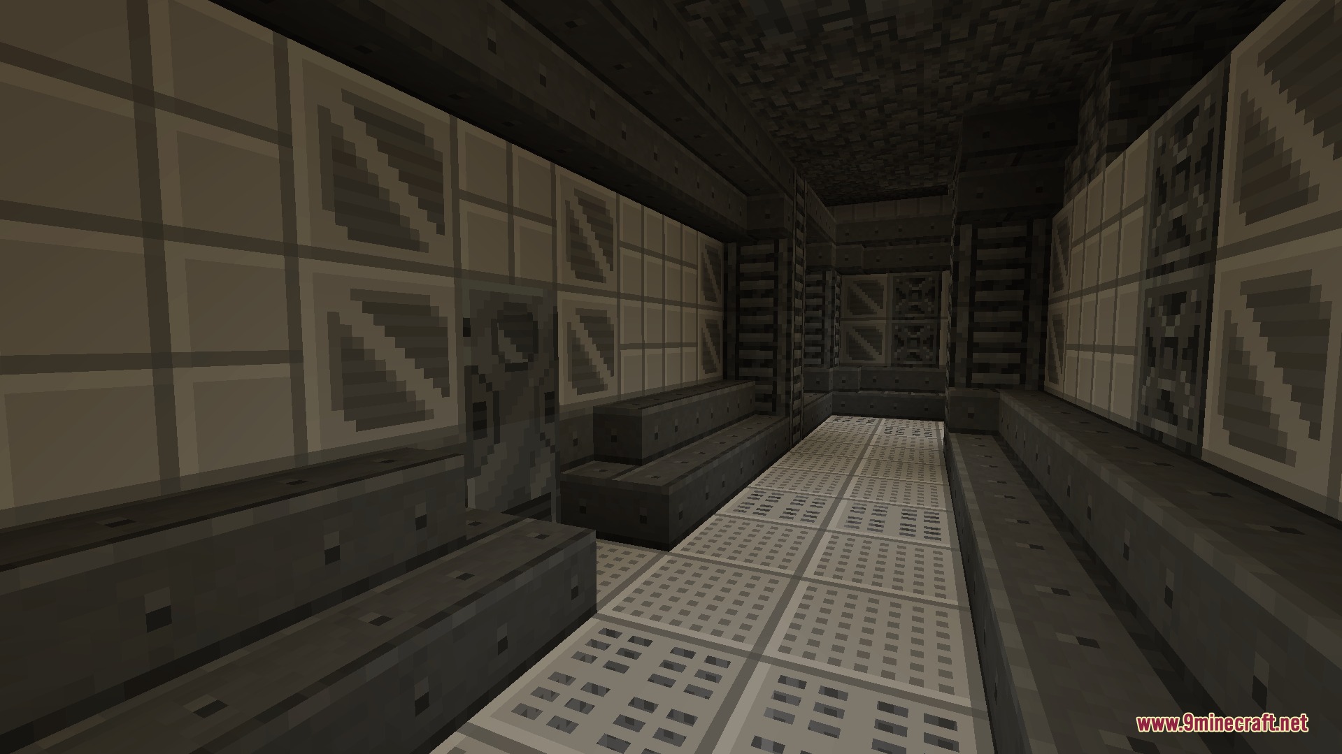 An empty corridor constructed with industrial steel and titanium building blocks