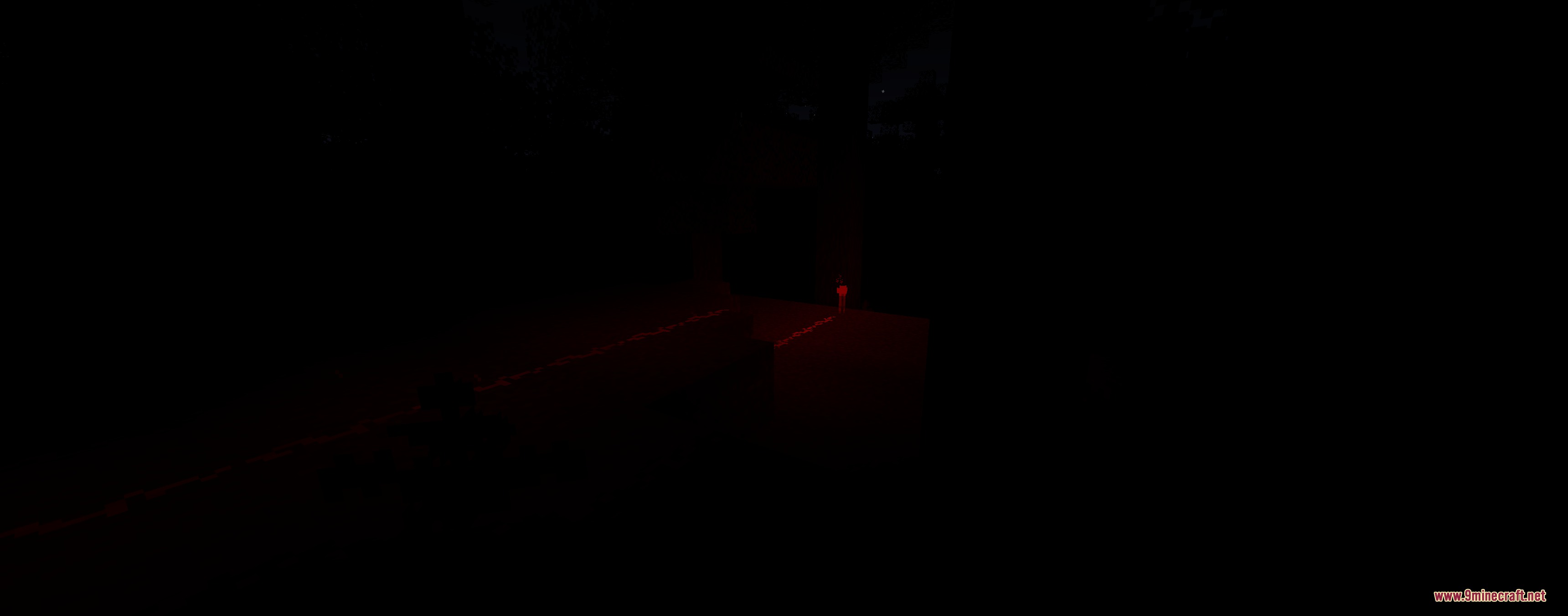 Colorful Lighting Sodium Embeddium Edition Mod Screenshot 2 A red light source casts a dim glow in a dark environment