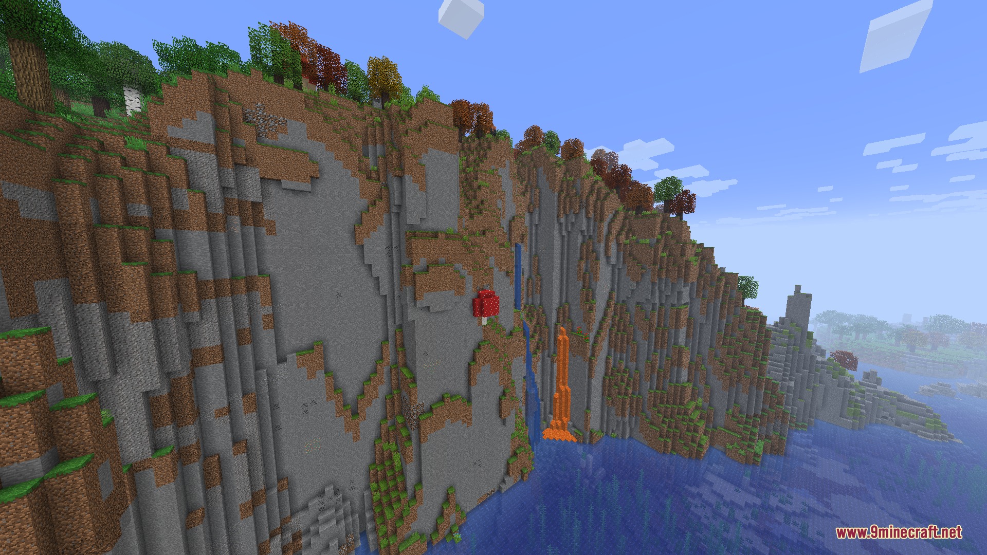 Tall cliffside with a waterfall and lava flow next to a red mushroom