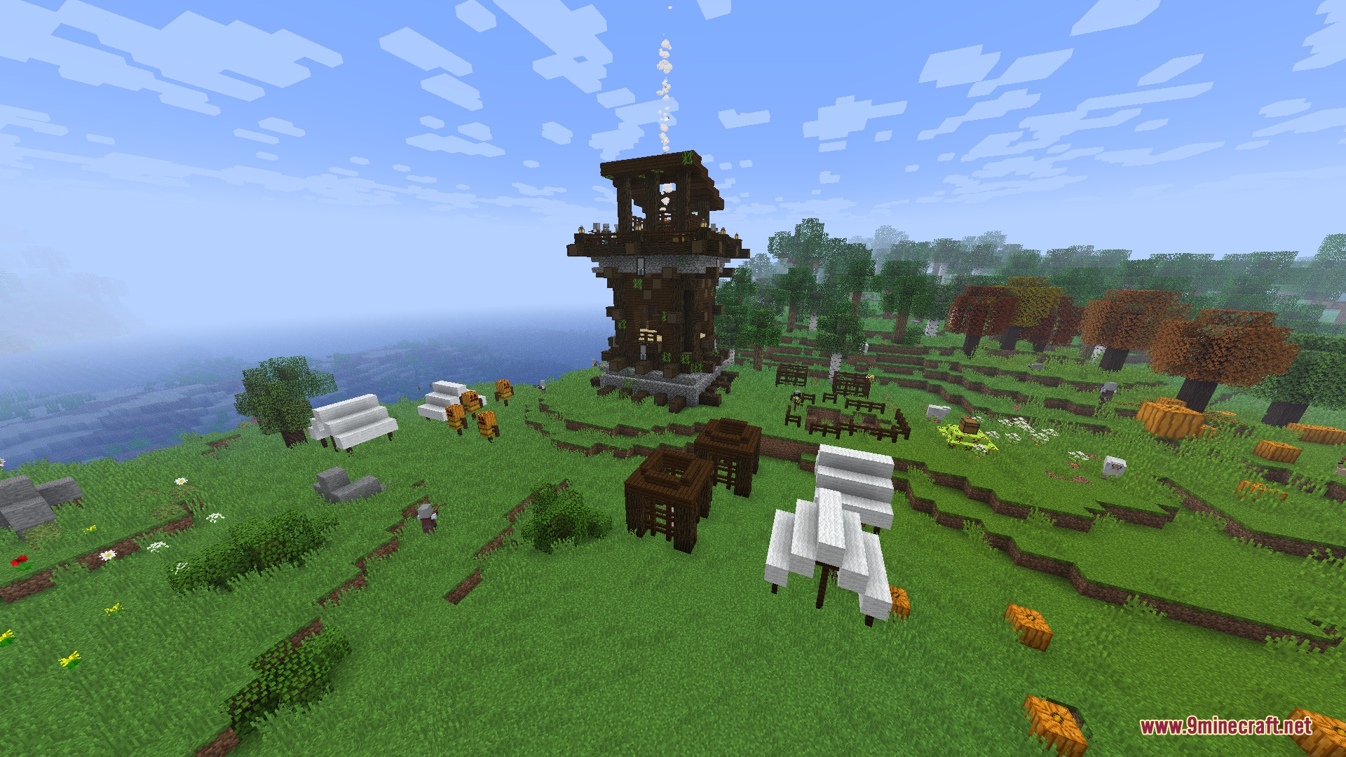 A pillager outpost surrounded by autumn trees and pumpkins in a field