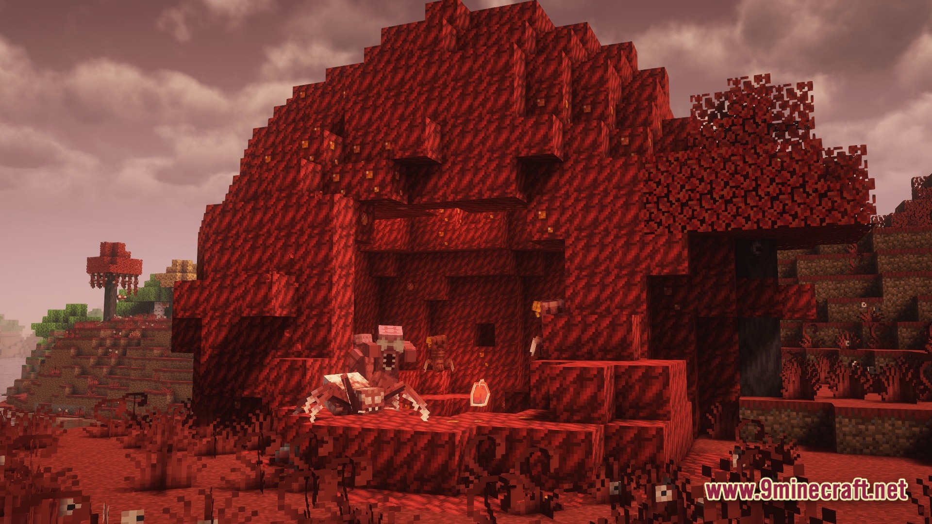 Hostile flesh-like mobs congregate near a large organic structure within a crimson-colored biome