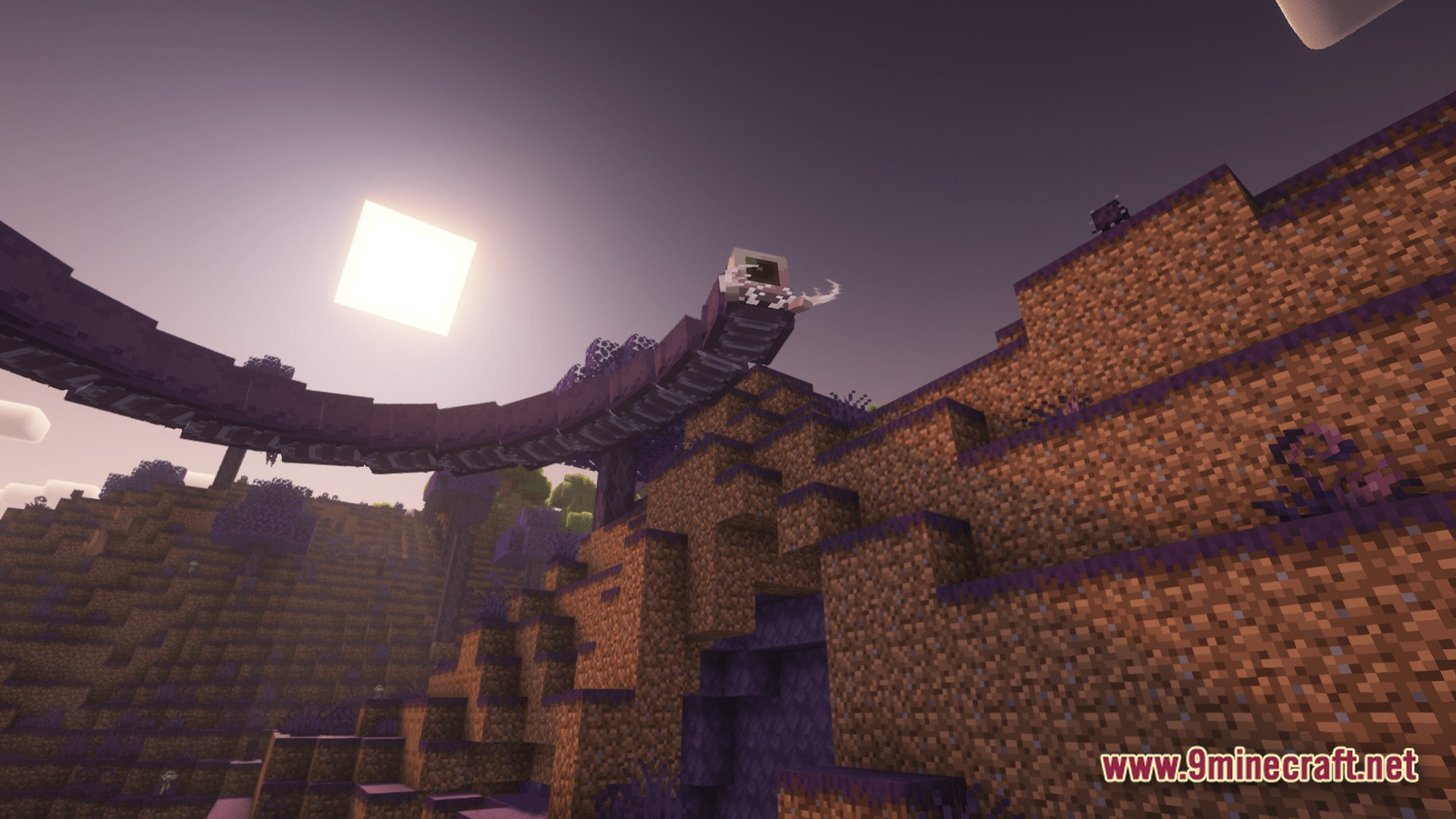 A large purple serpent creature flies through the sky above a hilly purple-tinted landscape
