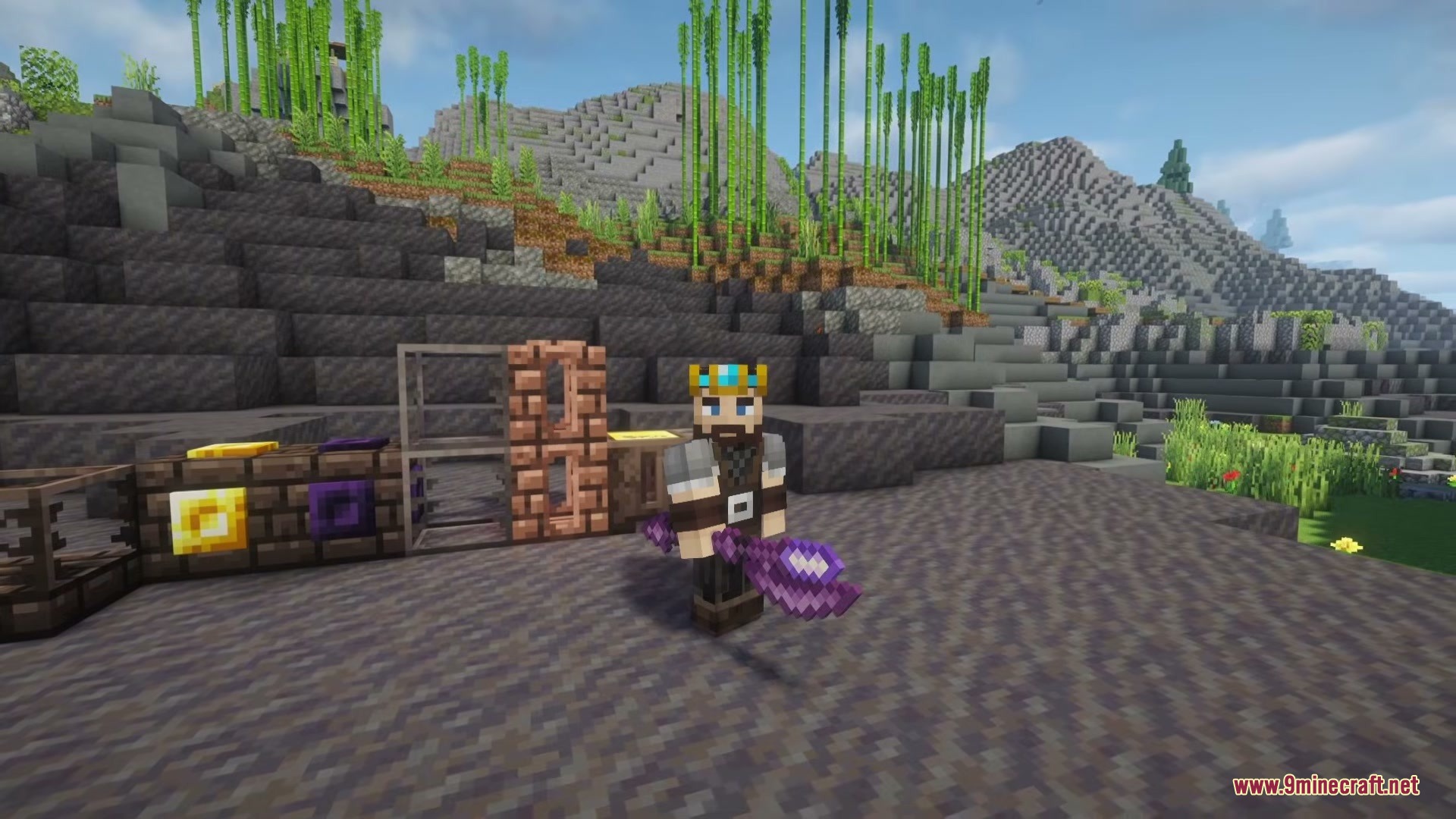 A crowned player character holding a purple battlestaff next to casting blocks