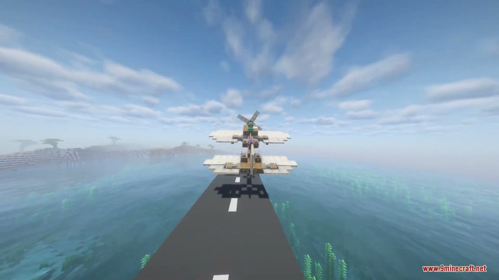 Create Aeroworks Mod Screenshot 1 A custom biplane from the Create Aeroworks mod flying over a runway