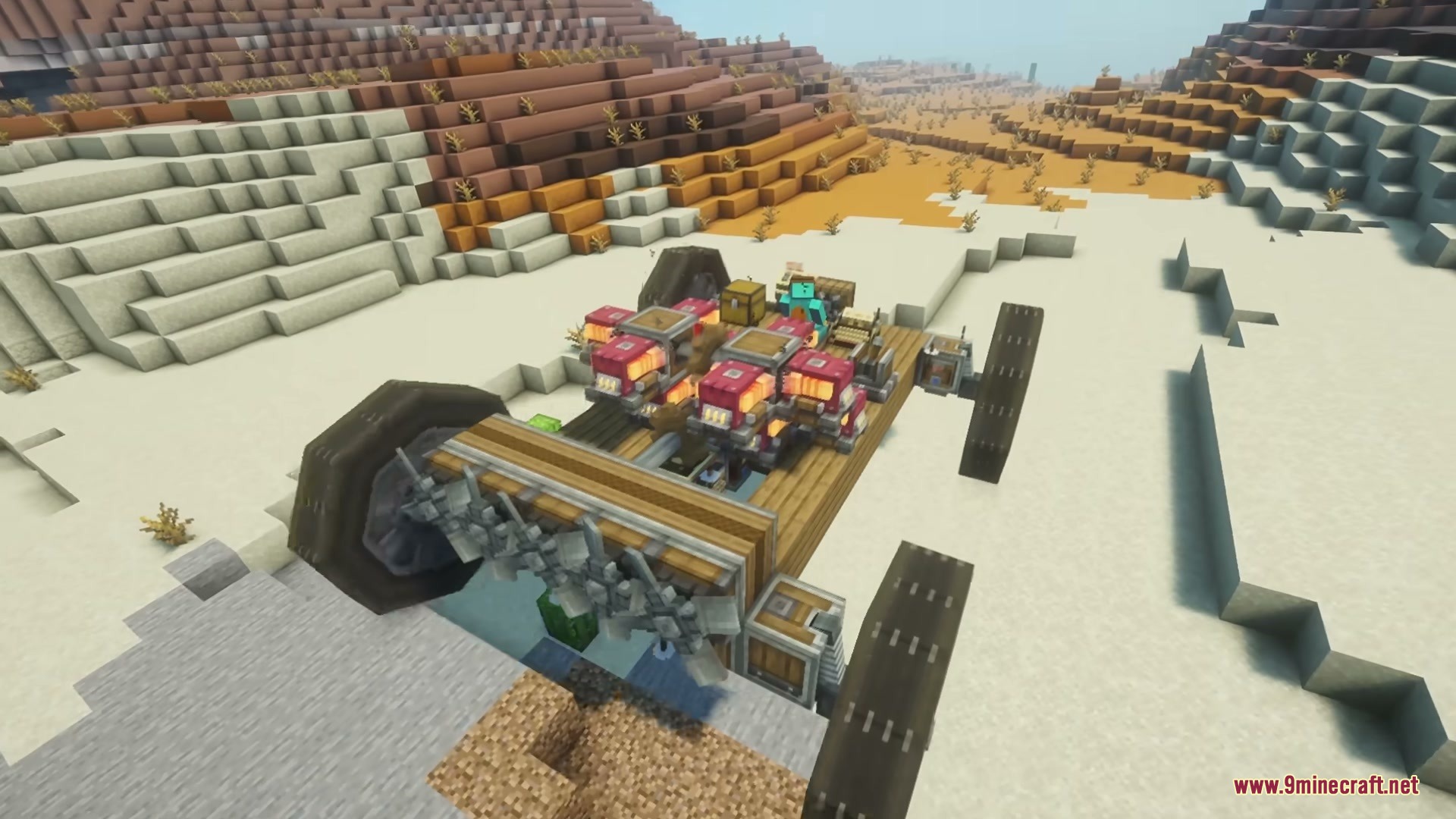 A complex mechanical vehicle with drills and engines parked in a desert biome