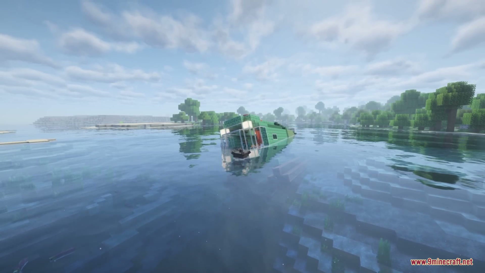Create Deep Seas Mod Screenshot 5 A green custom submarine floating on the surface of a calm ocean