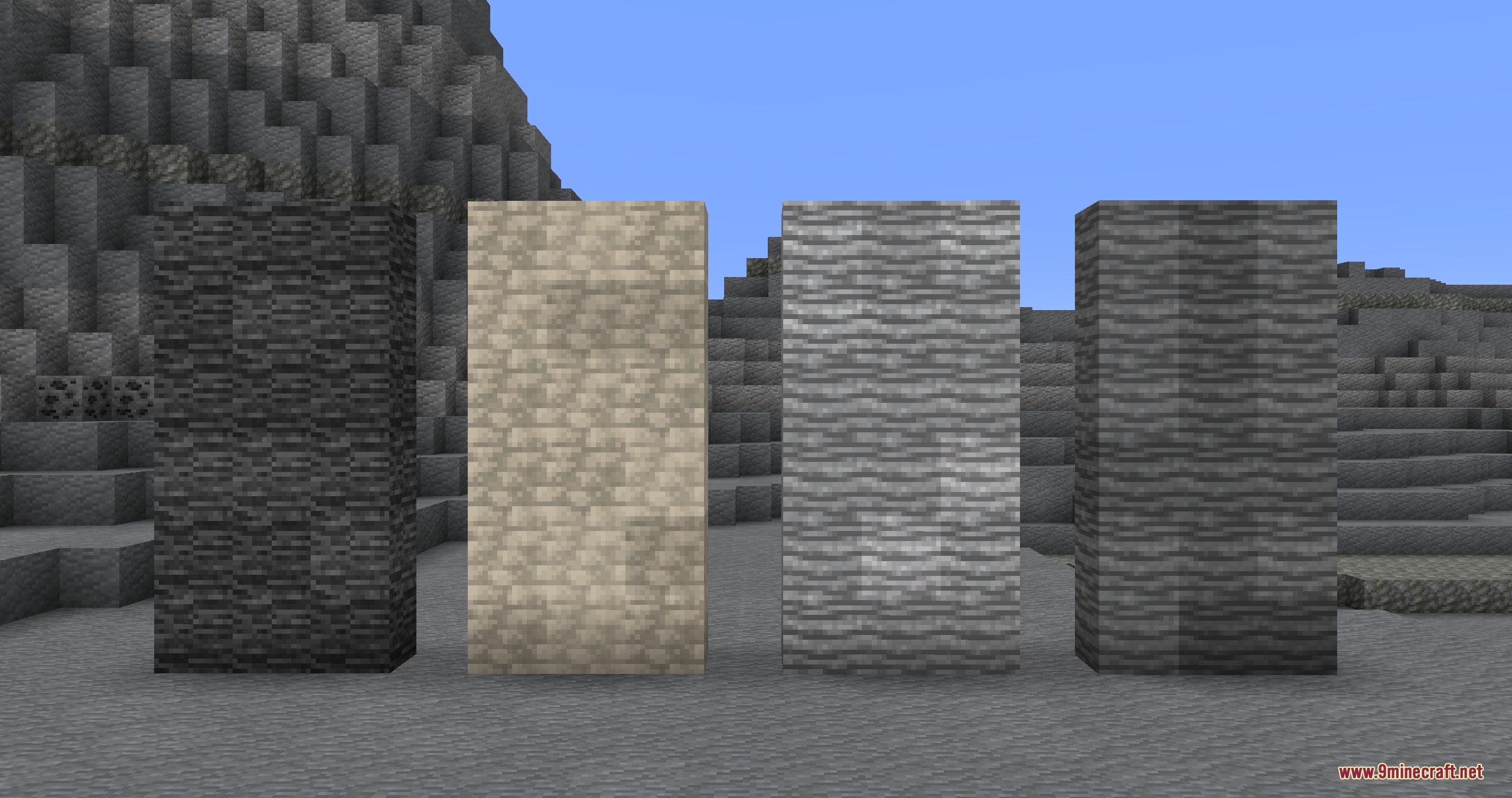 Create Geology Mod Screenshot 1 Four tall pillars showcasing new rock types from the Create Geology mod