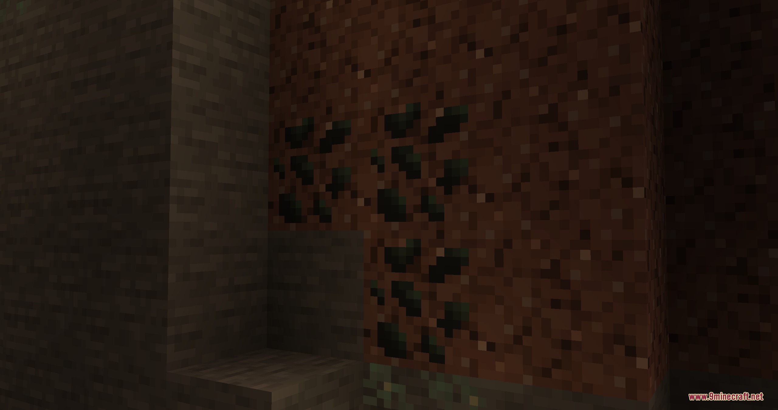 Create Geology Mod Screenshot 7 Dark ore veins embedded in a dirt wall deep underground