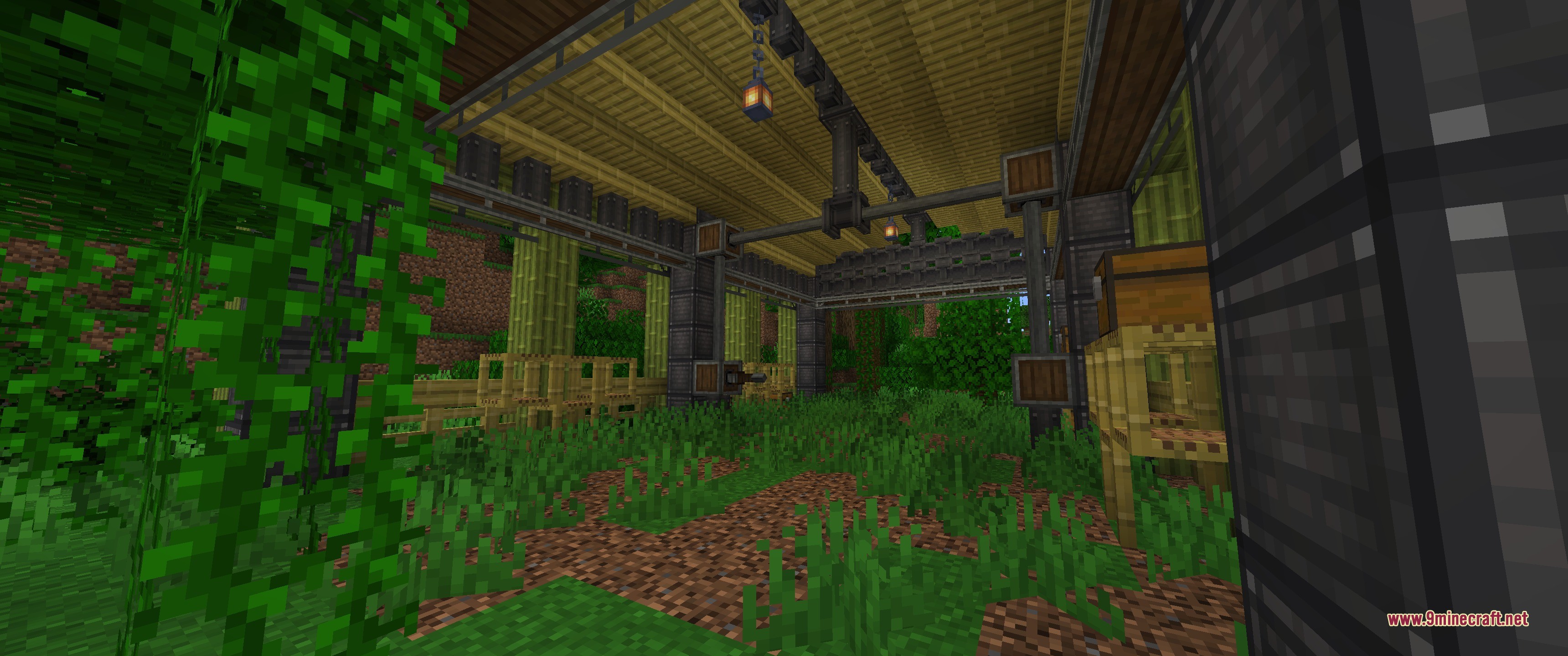 A bamboo hangar structure with chests and scaffolding located in a jungle biome