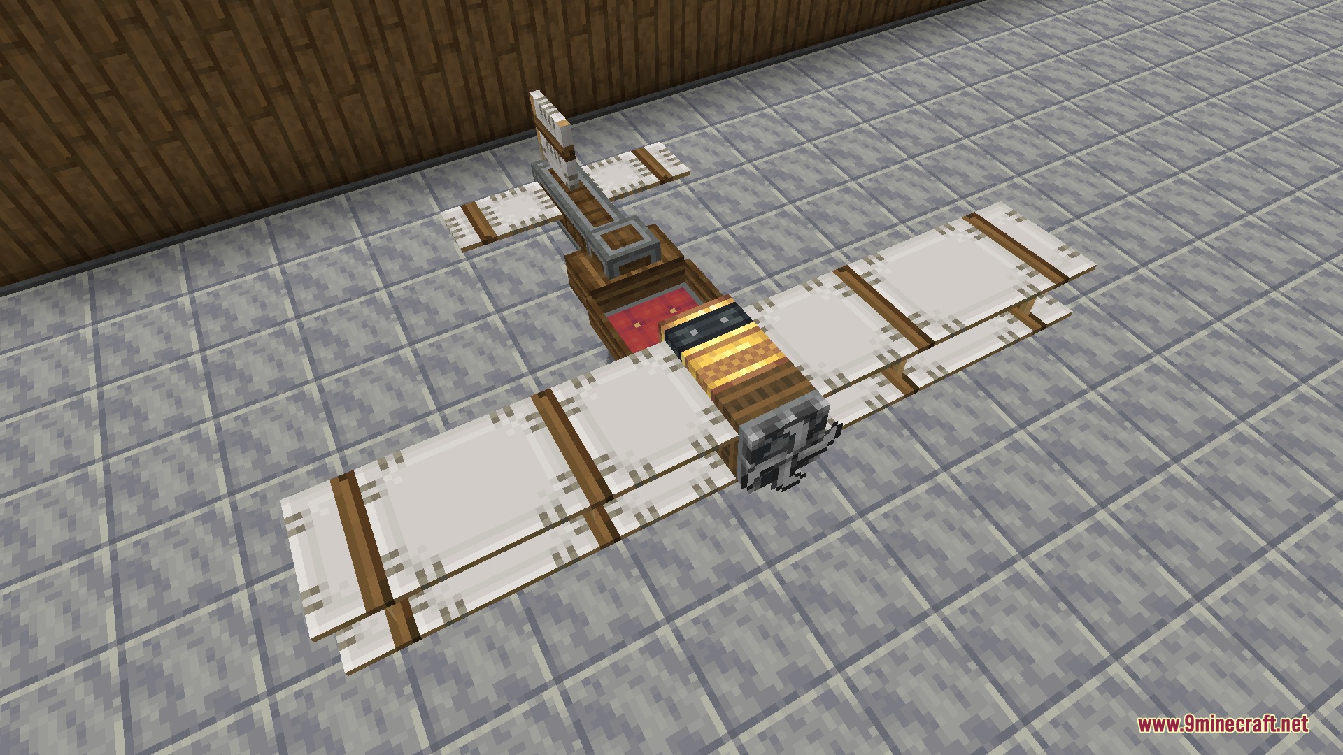 A white biplane with wooden frames and a front propeller in Minecraft