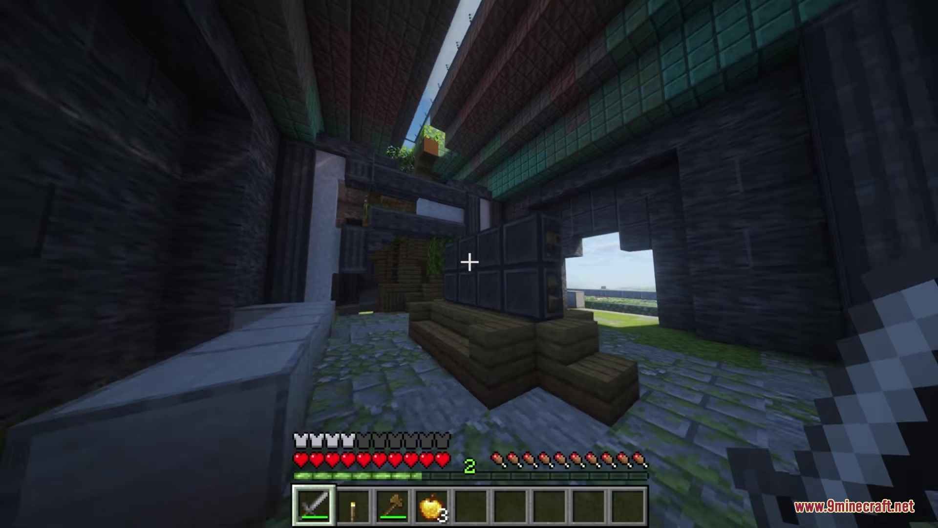 Player stands before a large mechanical stamping press inside a dark stone structure