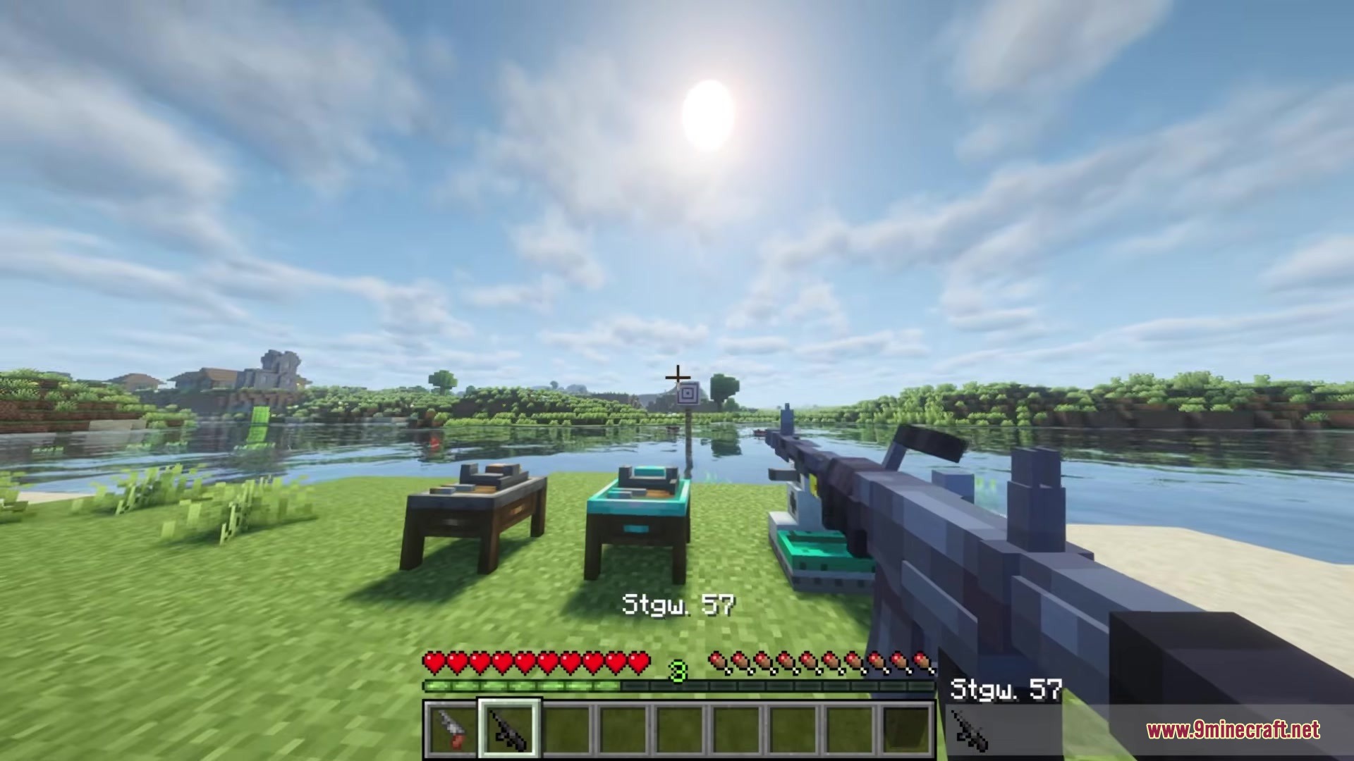 Player holding a Stgw 57 rifle near gunsmithing tables by a lake