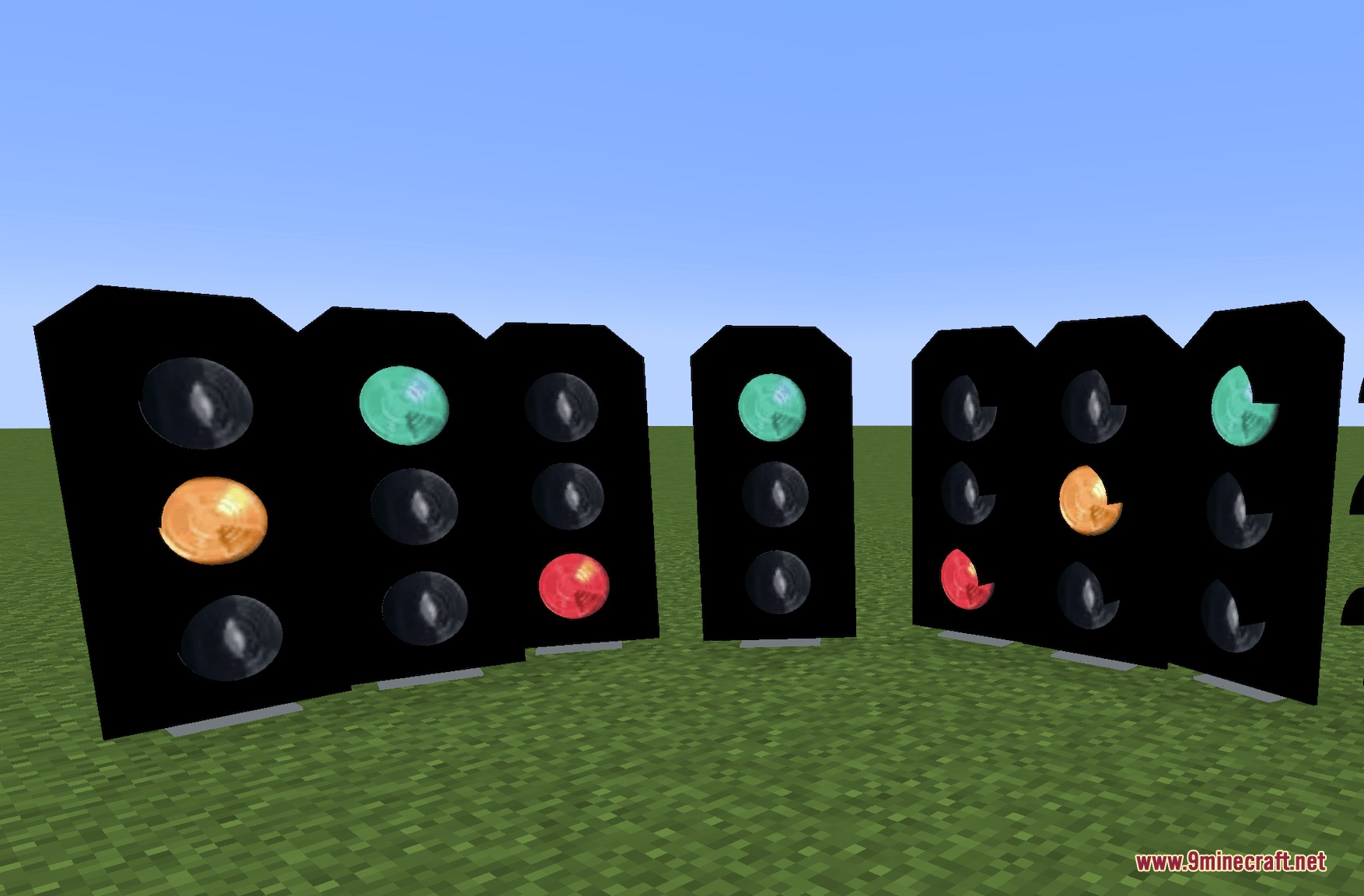 Create Realistic Railways Mod Screenshot 1 Multiple railway signals with green yellow and red lights on a grass field