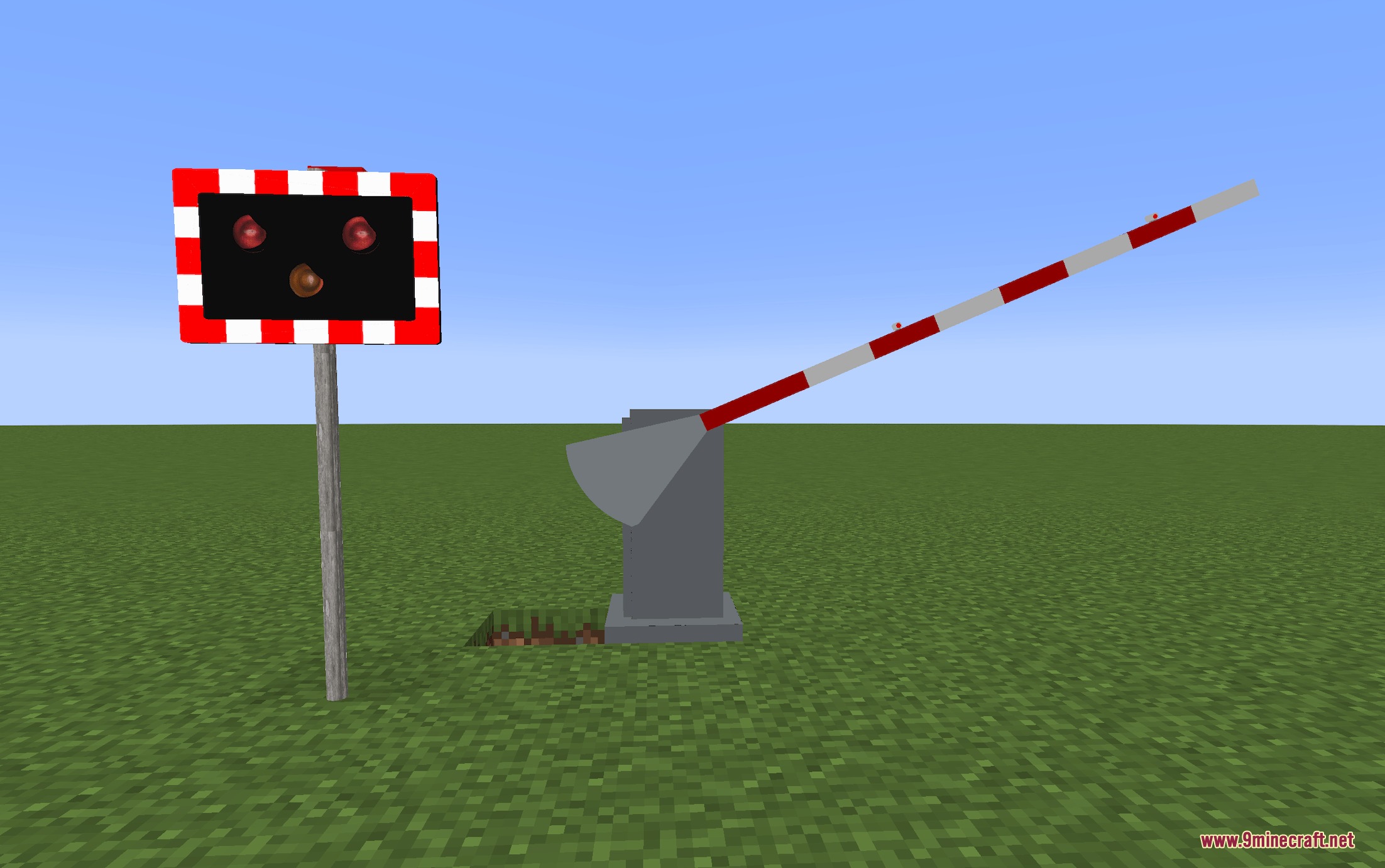 Create Realistic Railways Mod Screenshot 2 A railway level crossing featuring a red warning sign and a barrier arm