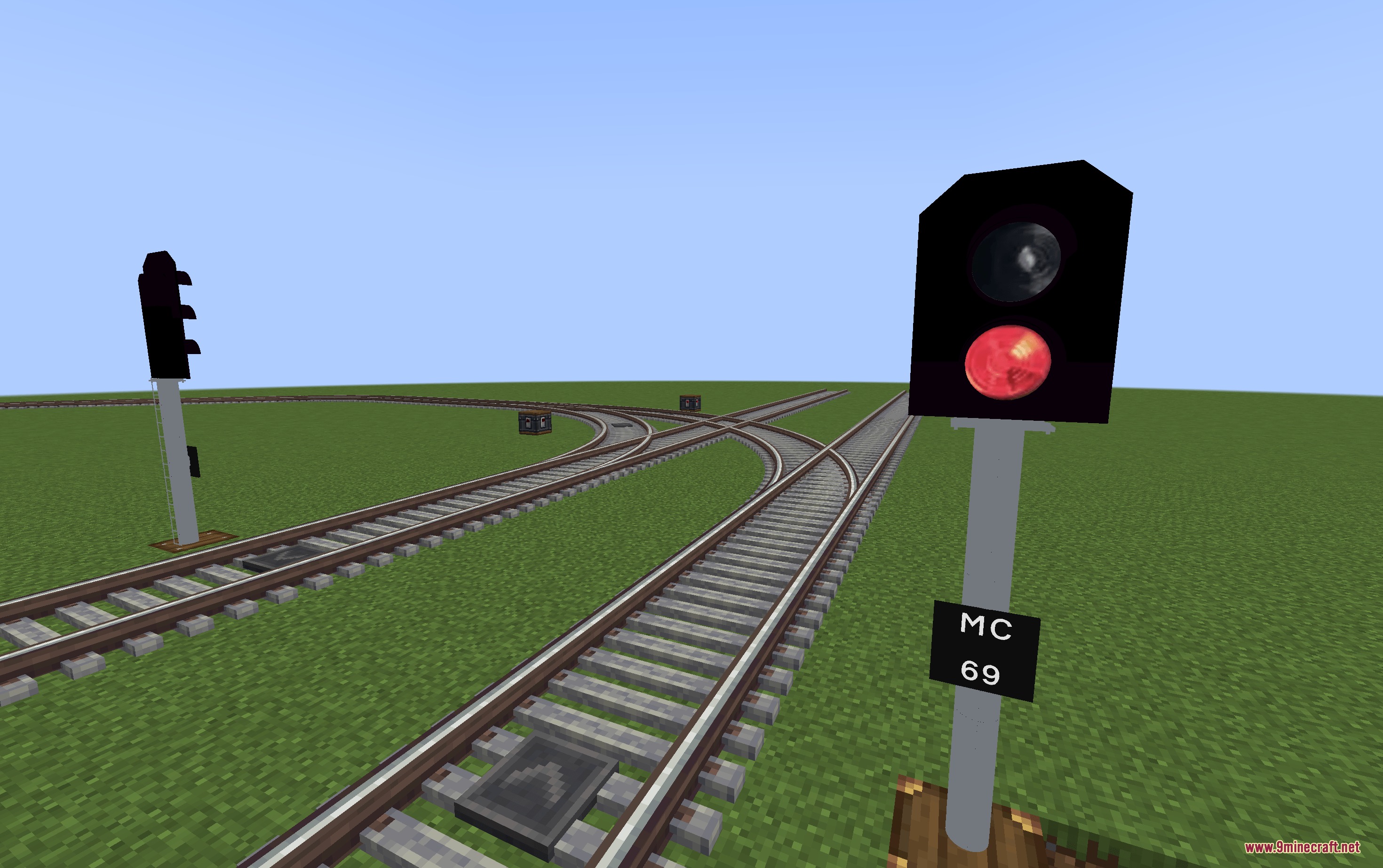 Create Realistic Railways Mod Screenshot 6 A red railway signal from Create Realistic Railways Mod controls curved tracks