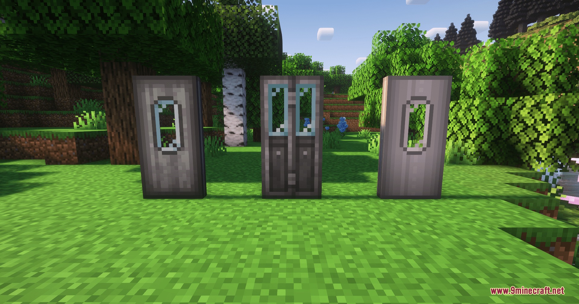 Create Train Utilities Create Train Doors Mod Screenshot 4 Three grey metallic train doors with windows standing in a grassy field