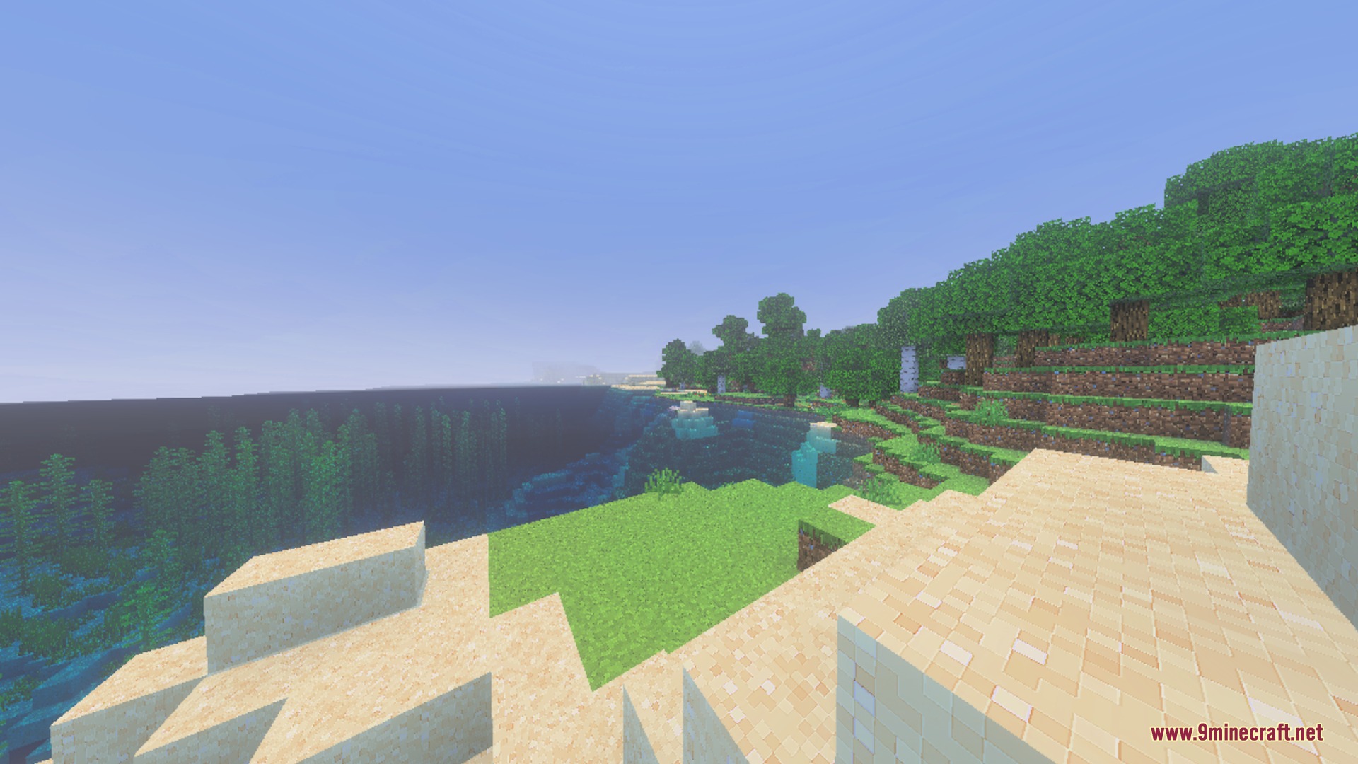 A beautiful Minecraft coastal view with sandy shores and dense green forests