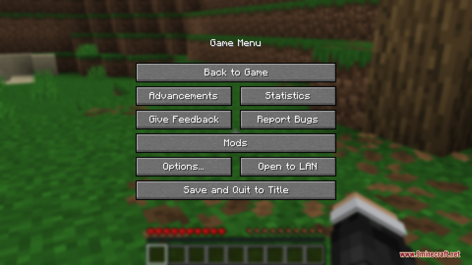 The game menu screen is open while the player stays crouched