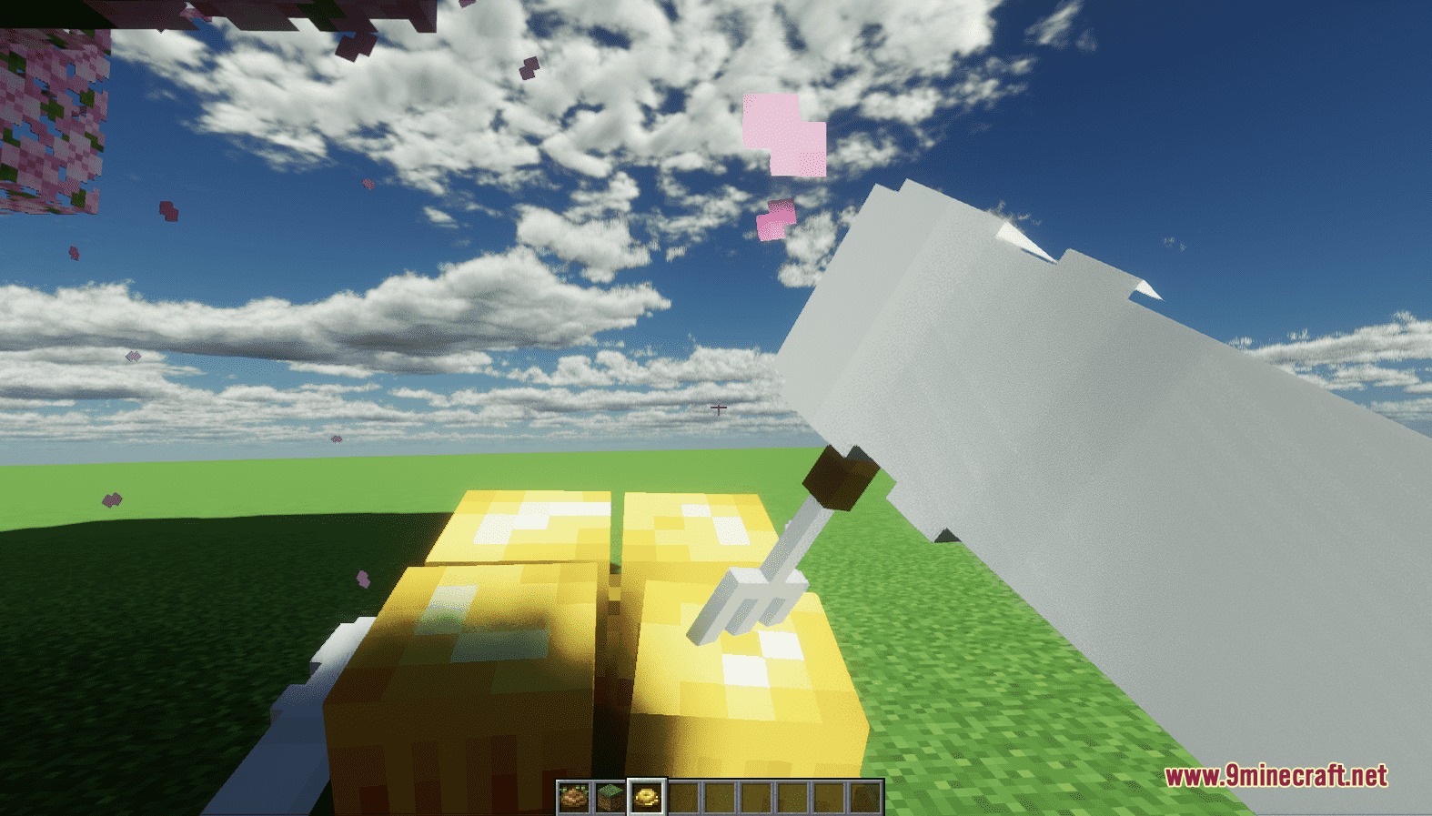 First person perspective of a player eating yellow food with a small fork