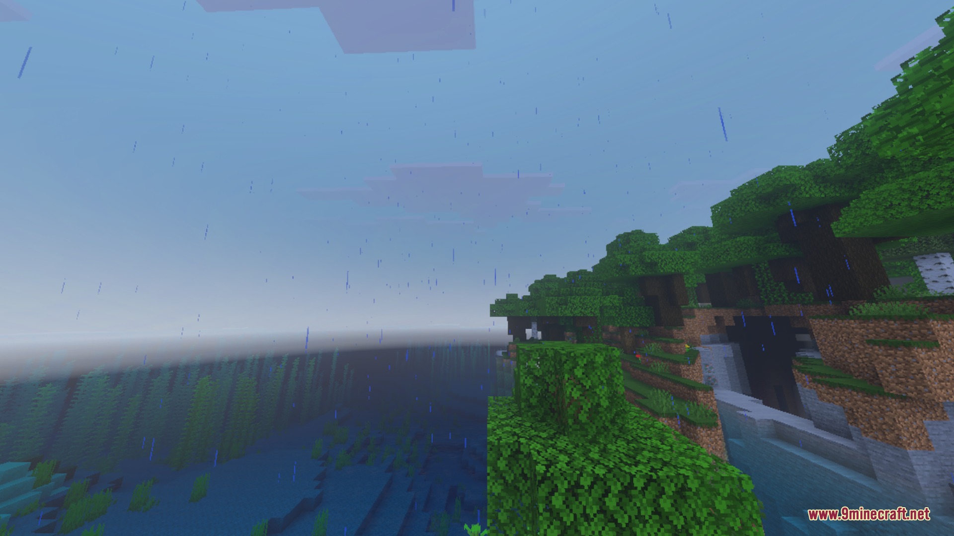 Custom Atmospherics mod showing rain falling over a forest and ocean biome