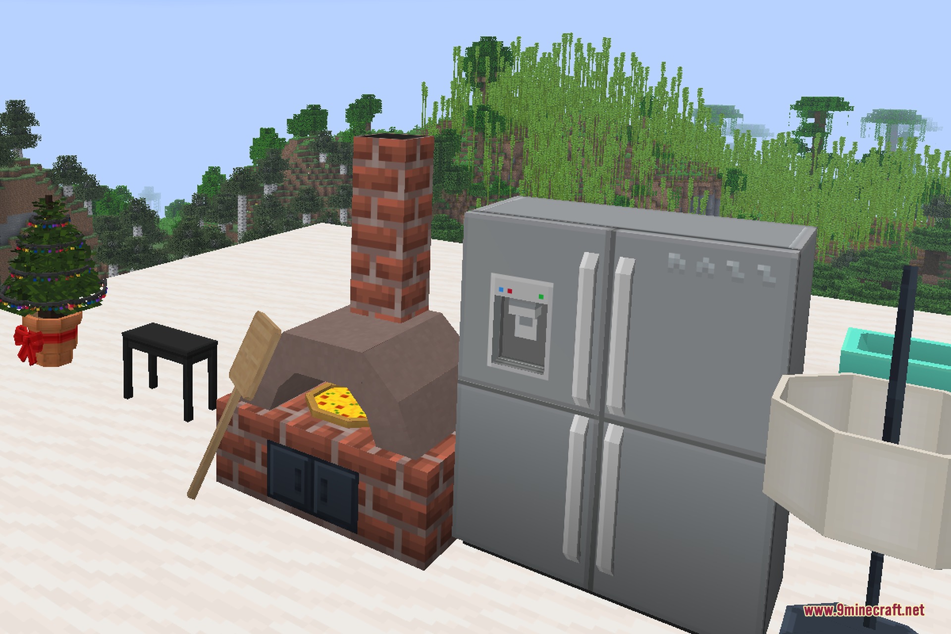 Decocraft 9minecraft Mod Screenshot 5 A brick pizza oven and a large silver refrigerator placed on snowy ground