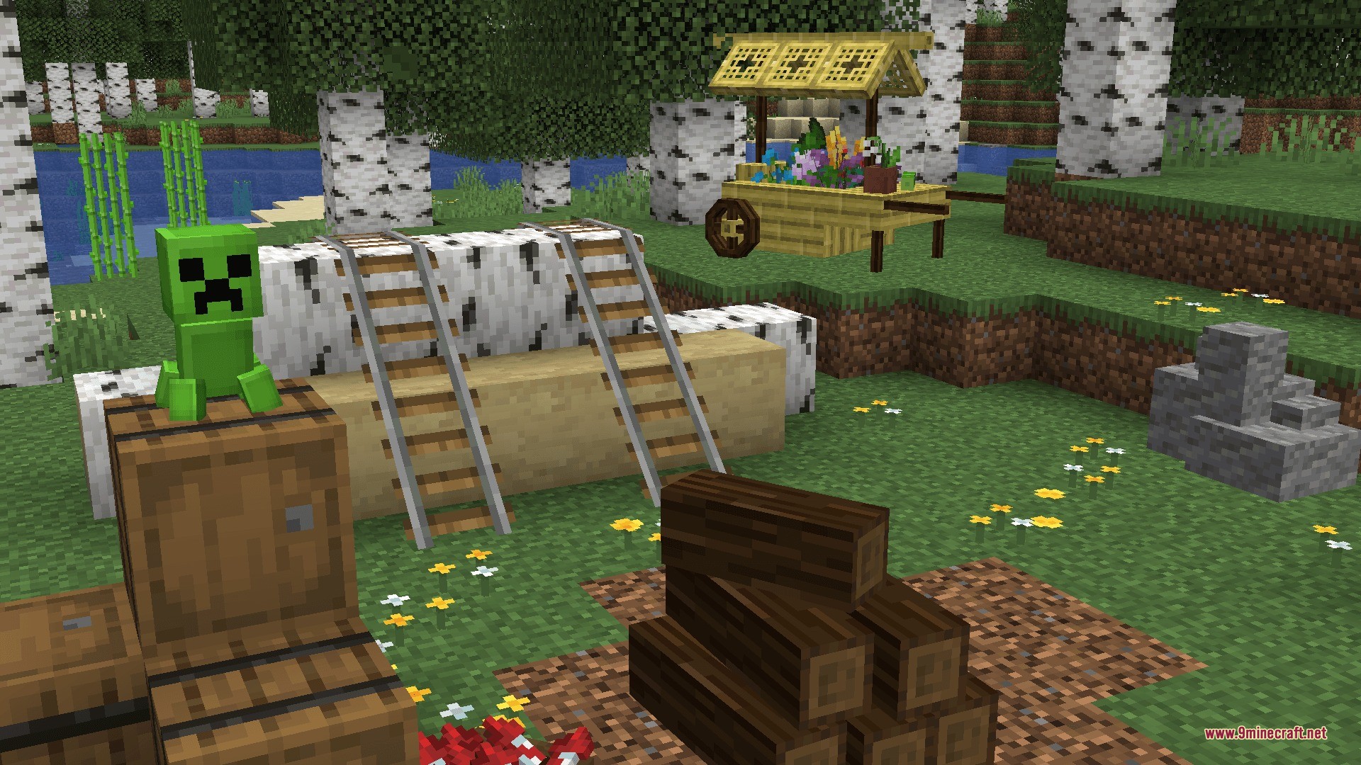 Decorations Plus Data Pack Screenshot 2 A tiny creeper figurine on a barrel next to birch logs and ladders