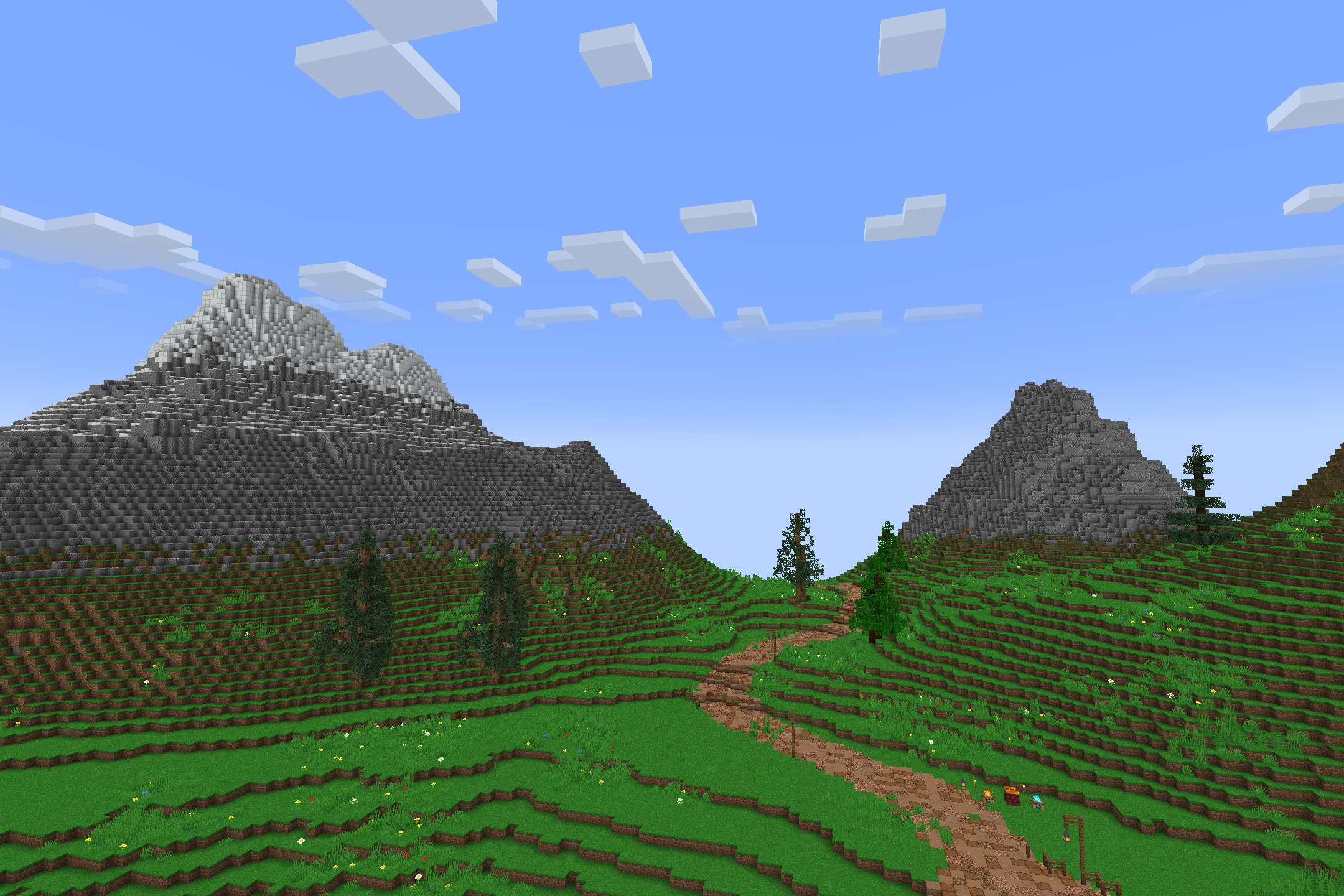 Diamond SMP PVP Default Resource Pack Screenshot 3 A dirt path winds through green hills towards tall mountains under a blue sky