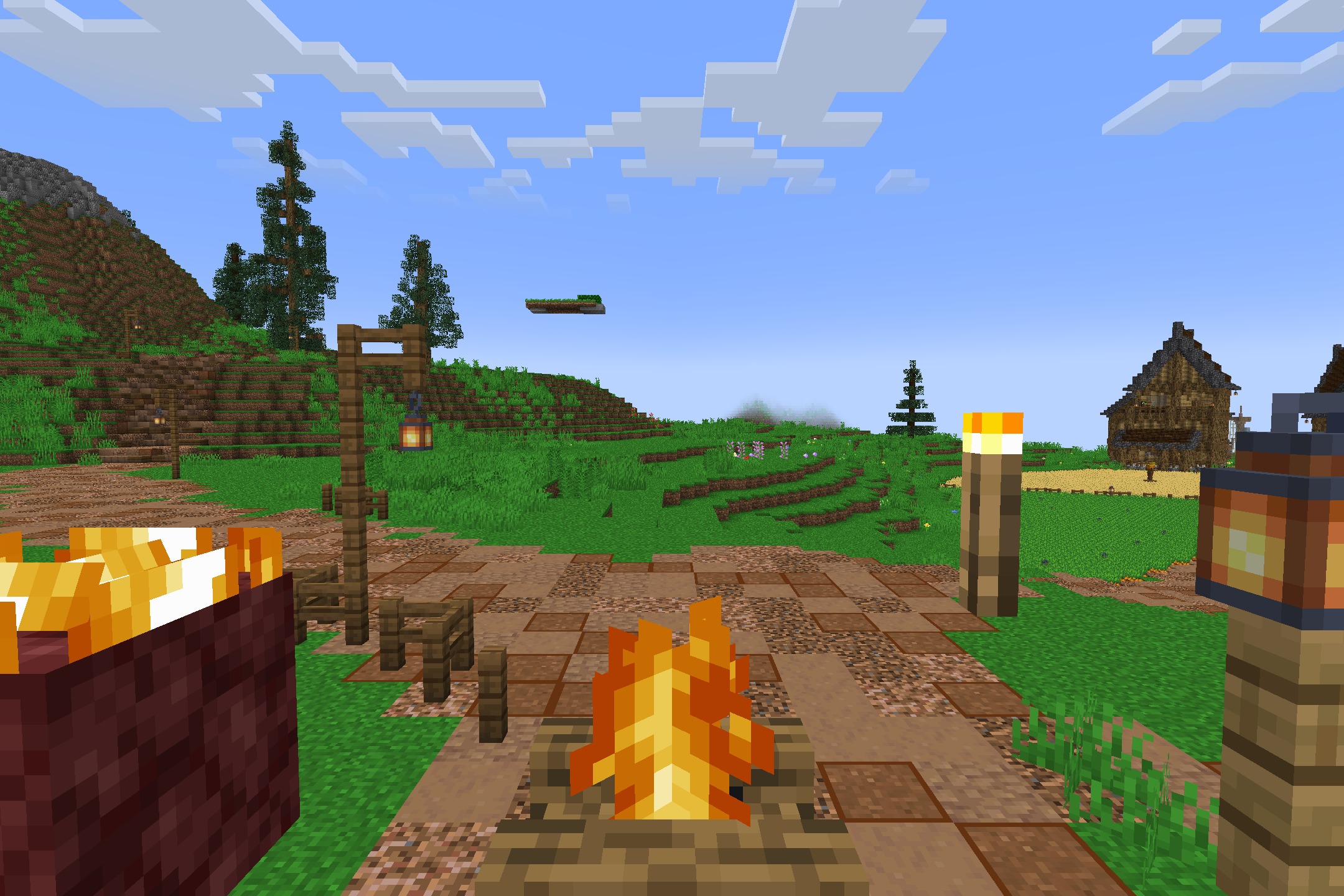 Diamond SMP PVP Default Resource Pack Screenshot 4 Campfires and lanterns light a path leading to a wooden house in the distance