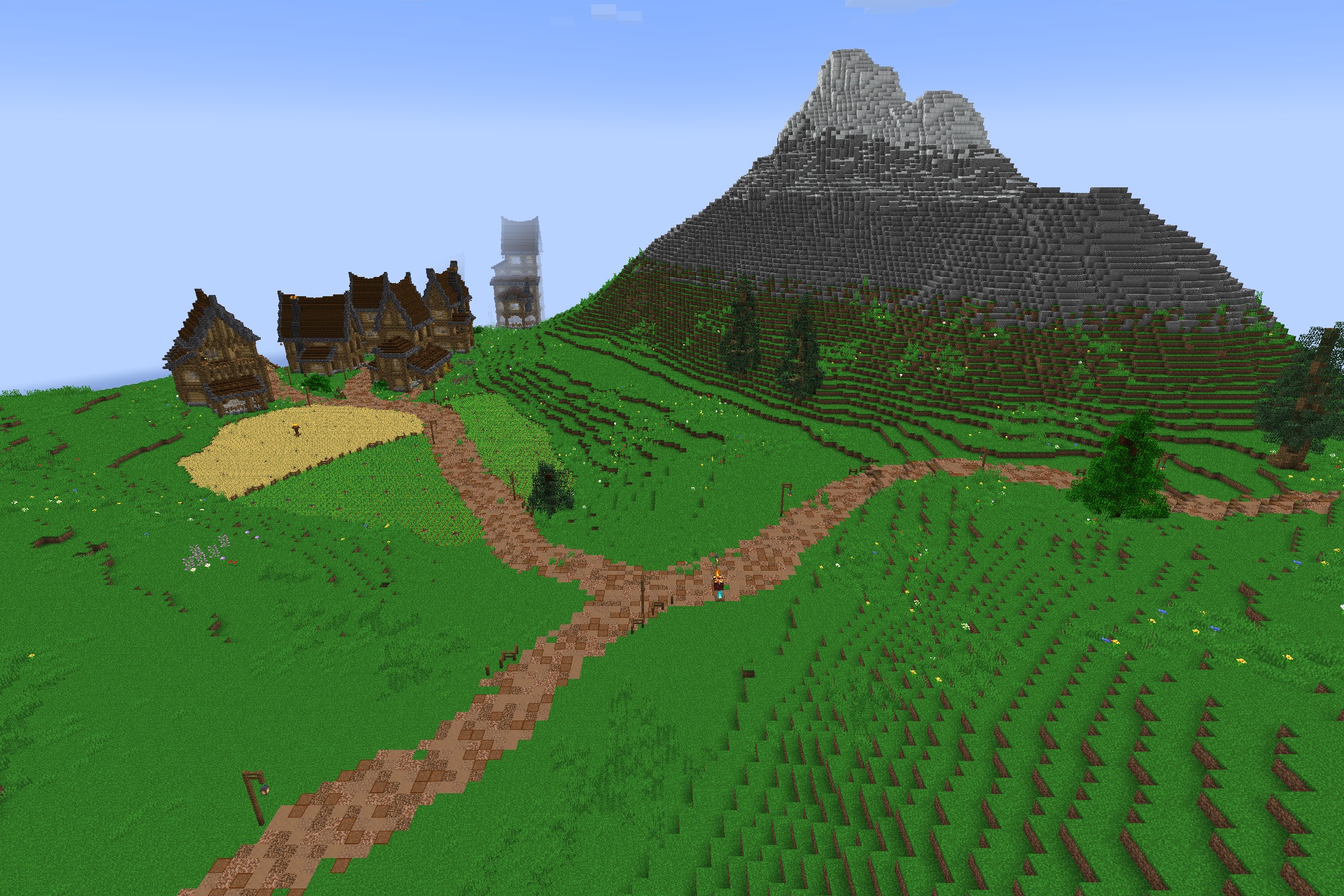 Diamond SMP PVP Default Resource Pack Screenshot 6 A small village with wooden houses and a wheat field near a mountain