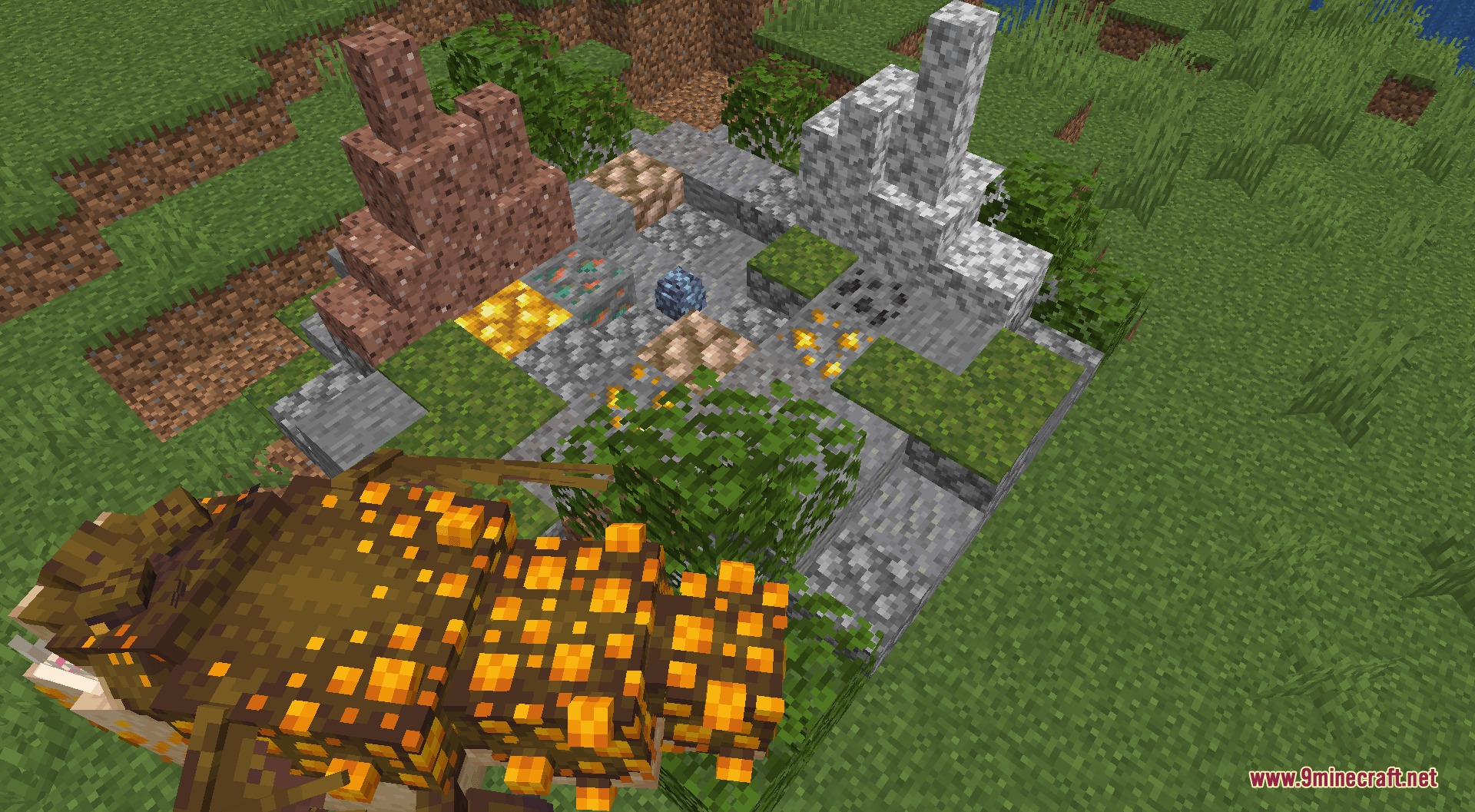 A Gronckle dragon nest built with various stone and ore blocks