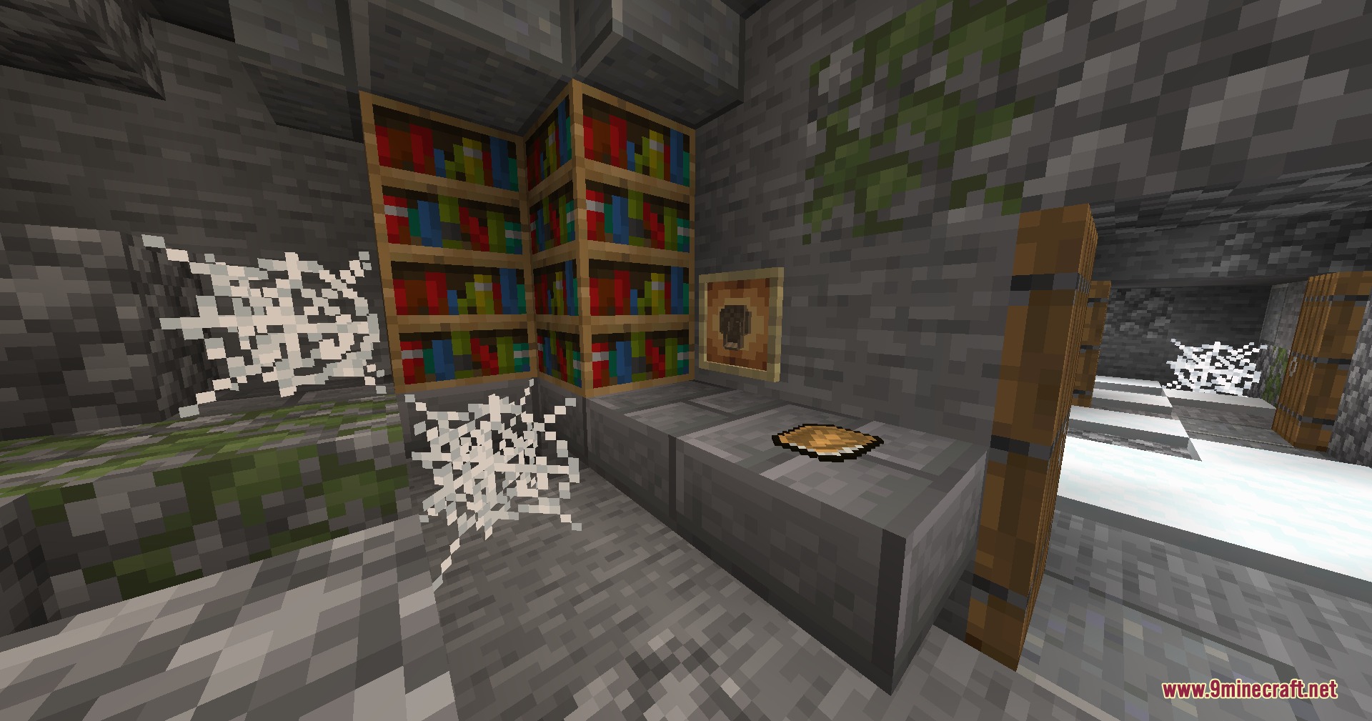 Dragon Priest Mod Screenshot 3 A Dragon Priest mask in an item frame next to bookshelves and cobwebs