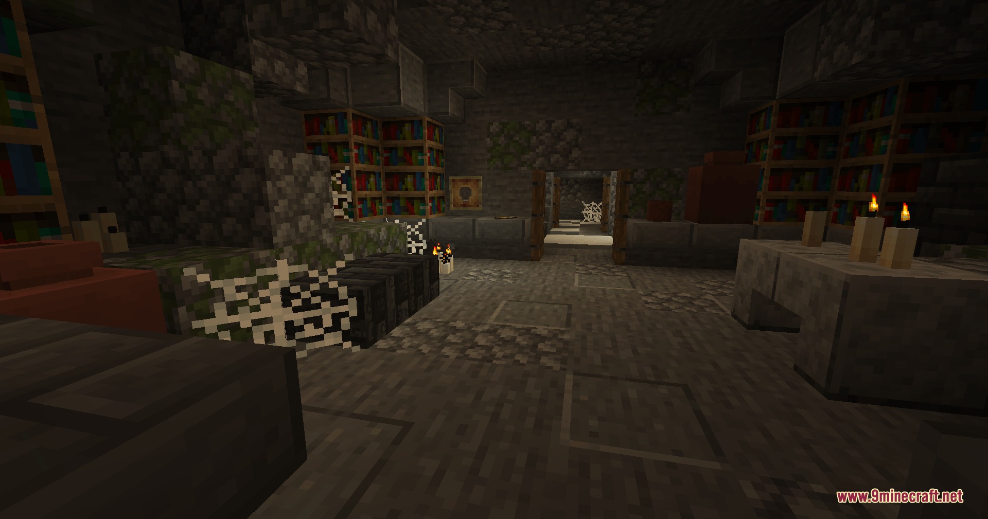 Dragon Priest Mod Screenshot 4 A dark underground room with bookshelves candles cobwebs and a hallway in the distance