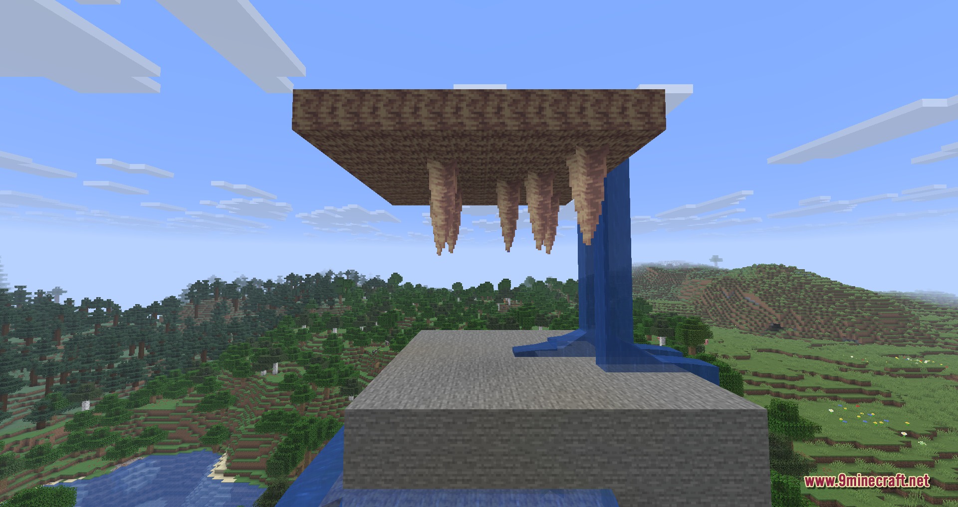 Water dripping from pointed dripstone stalactites onto a stone platform in Minecraft