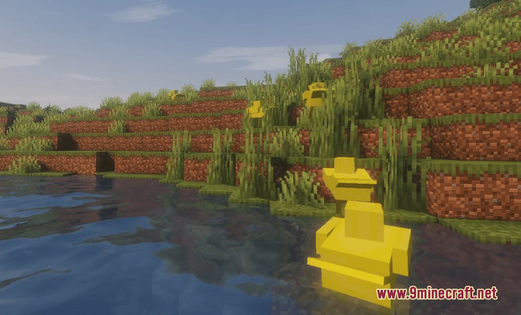 Yellow ducks swimming and standing near a river bank in Minecraft