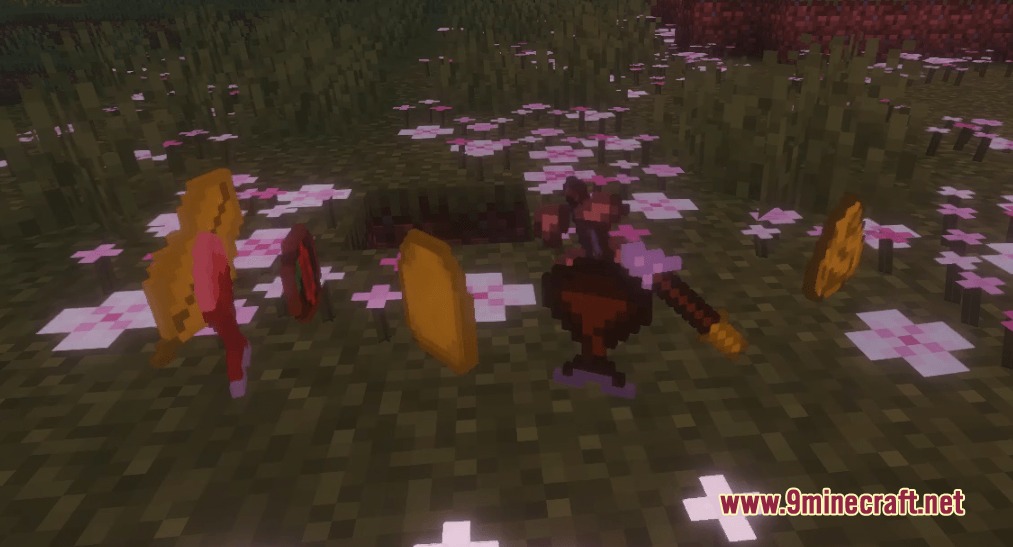 Various duck items and food drops scattered on a flowery grass field