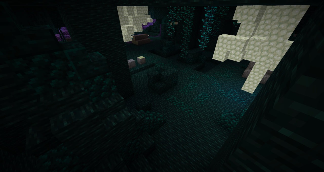 Massive bone structures standing in a dark cavern filled with sculk blocks