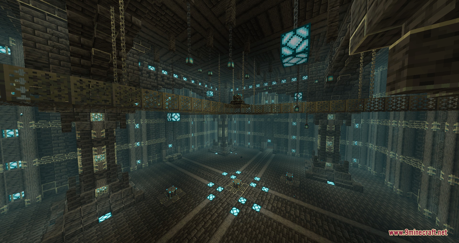 A vast underground fortress hall featuring glowing blue lights and stone pillars