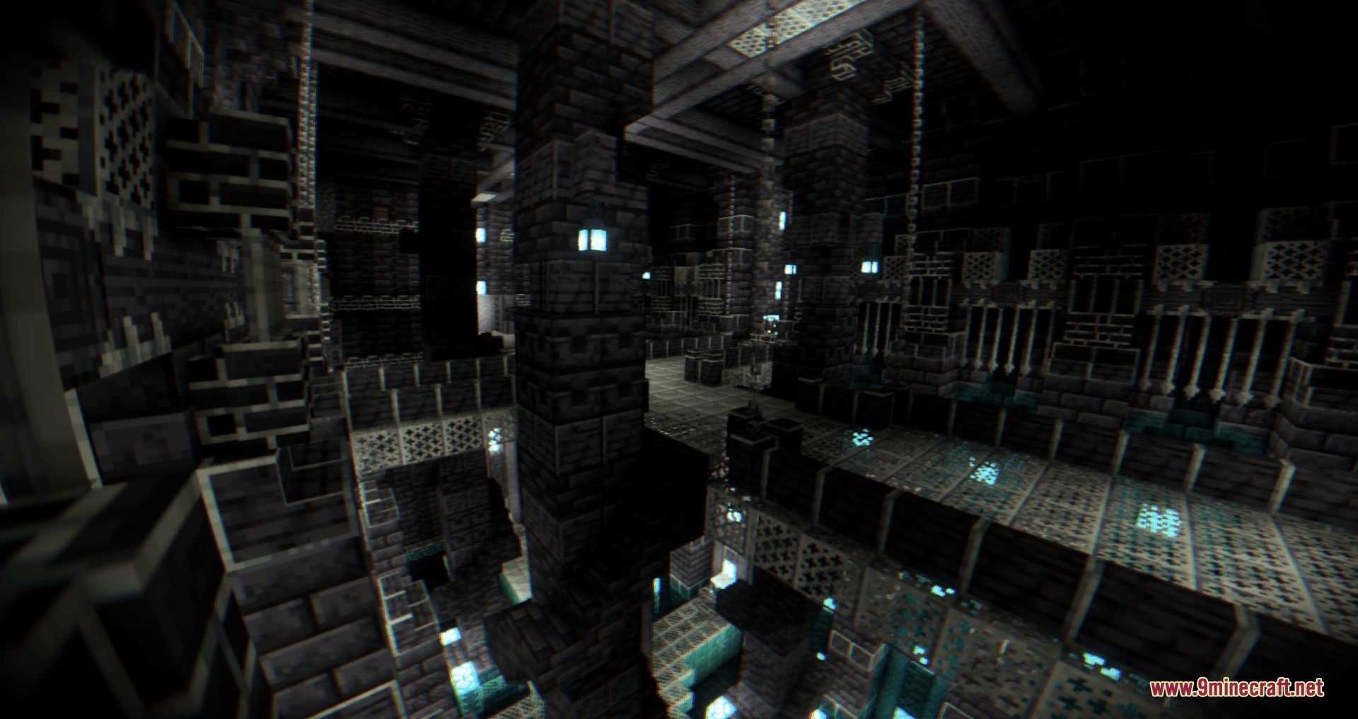 A massive underground hall featuring many stone pillars and glowing blue lights