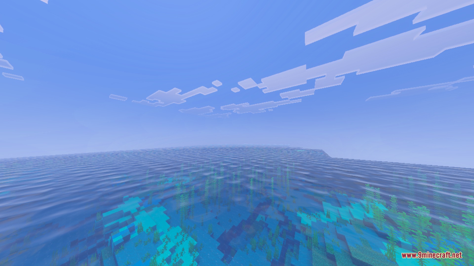 Dynamic Wave Shader Screenshot 1 A vast blue ocean with smooth wave animations and visible underwater plants