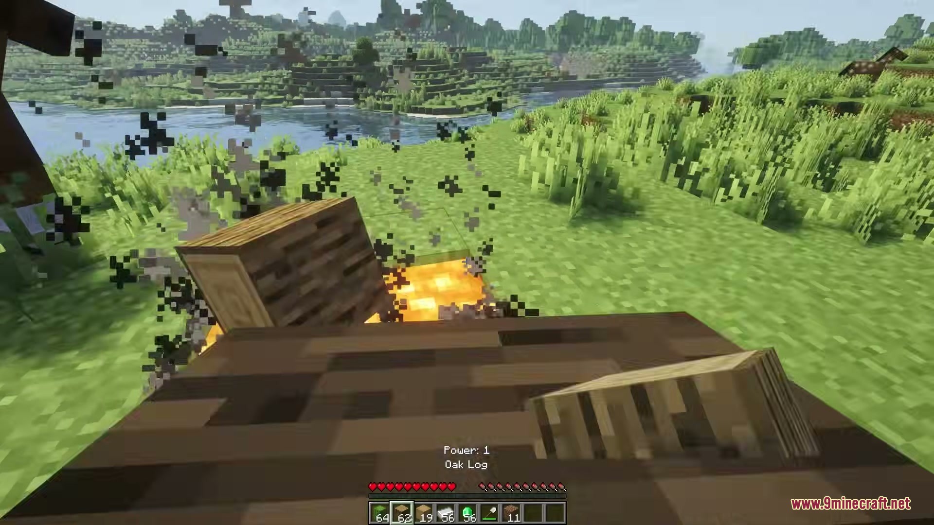 Eating Animations Mod Screenshot 8 Player holds an oak log with a bite animation near a lava pit