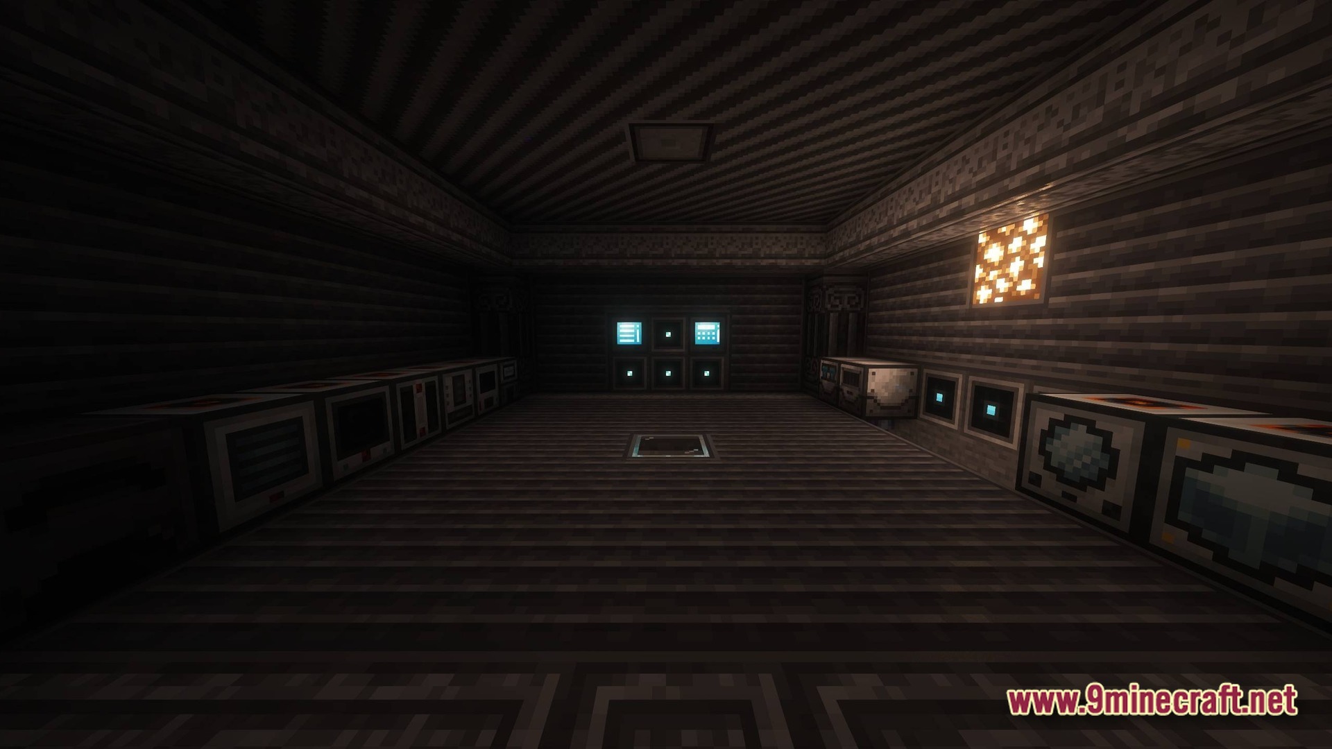 Industrial machines and technical components arranged inside a dark, metallic underground base structure