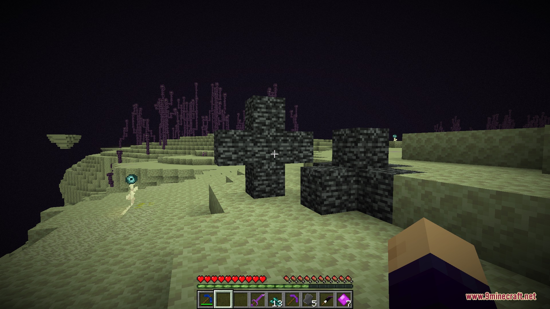 Enderfy Mod Screenshot 8 A player discovers mysterious bedrock cross structures on a floating End island