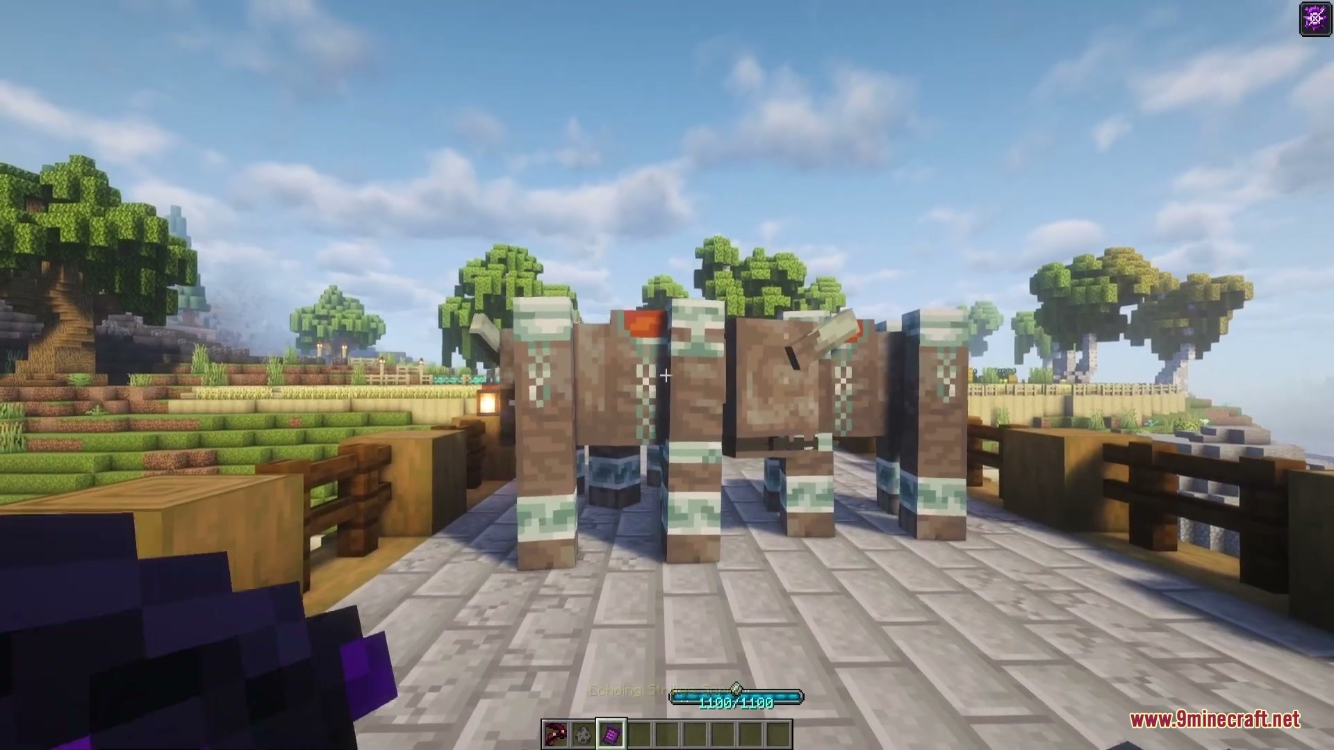 Enigmatic Arcana Mod Screenshot 3 A massive stone and metal beast stands on a bridge in Minecraft