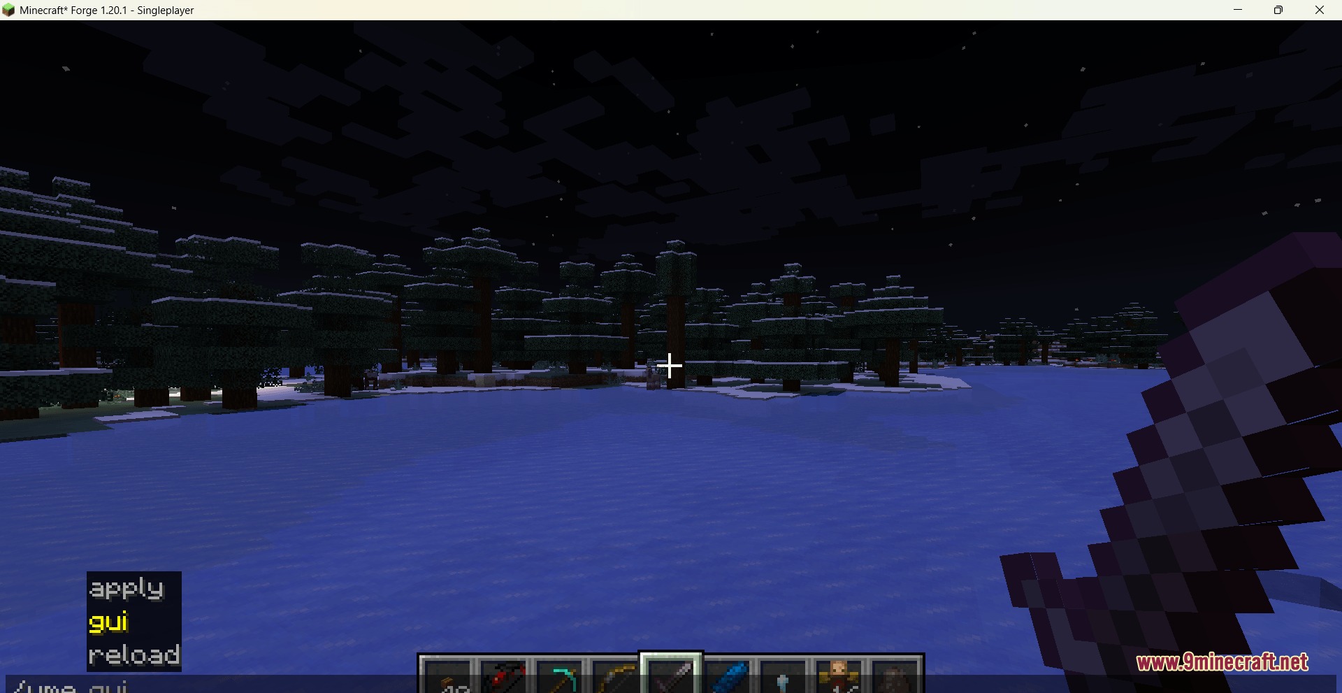 A player stands in a snowy forest at night using a command interface