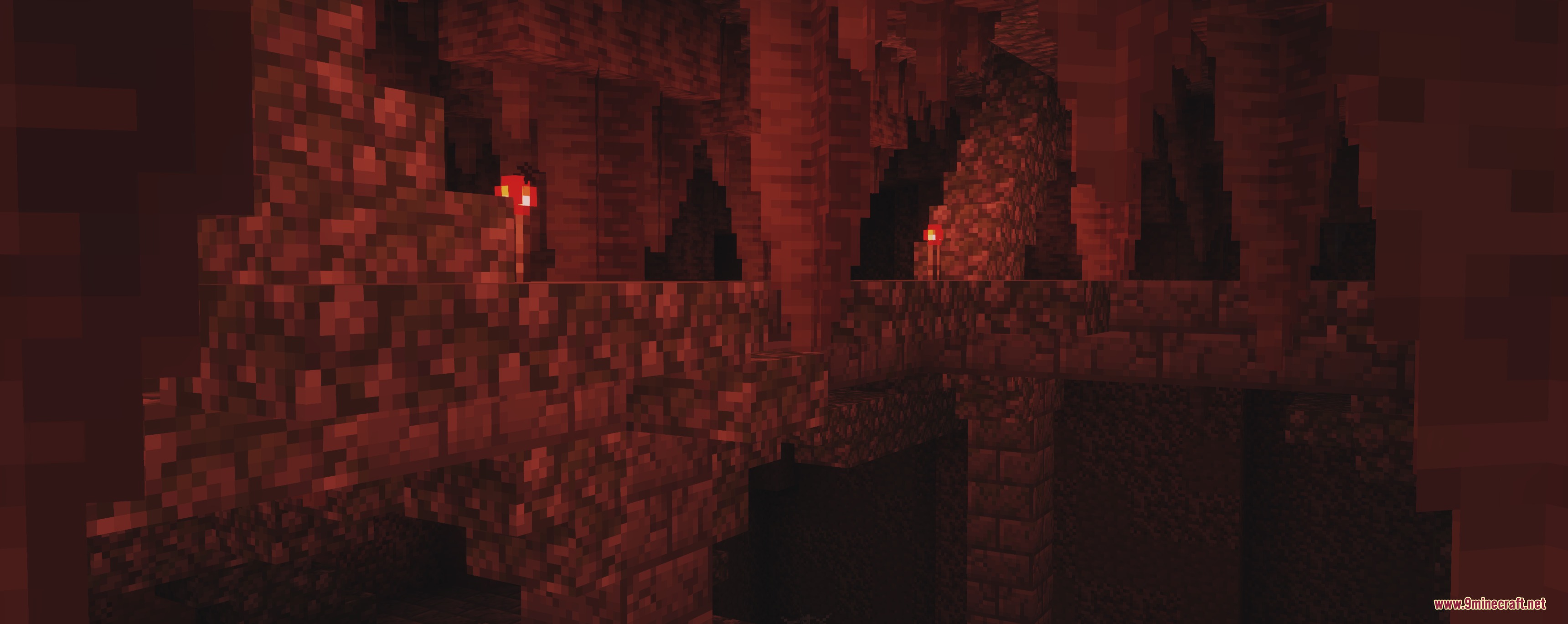 Epic Structures Jungle Temples Mod Screenshot 3 A dark stone bridge lit by redstone torches inside a deep underground cavern