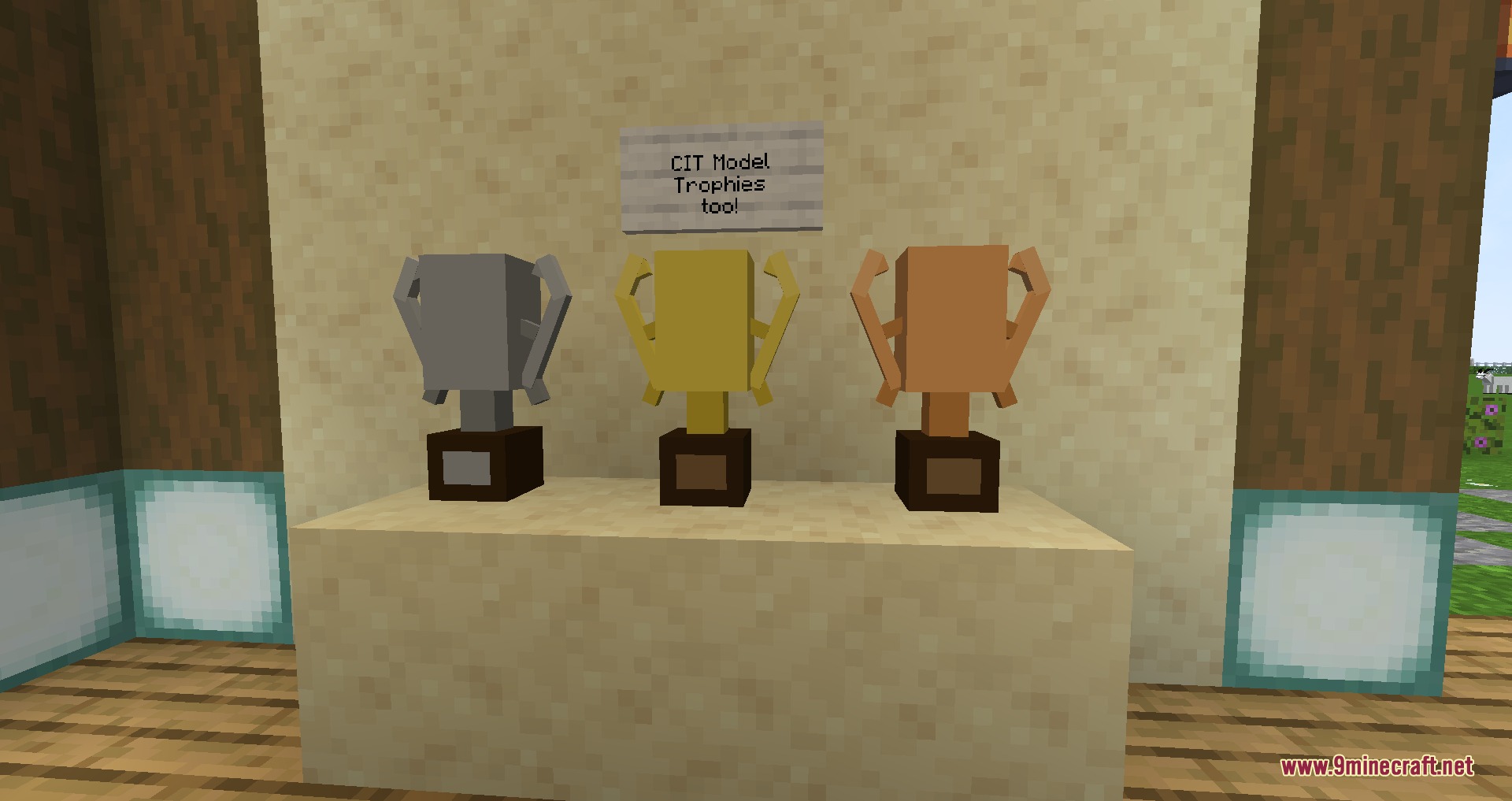Equestrian Canvas Expanded Mod Screenshot 1 Three trophies in silver gold and bronze colors displayed on a block
