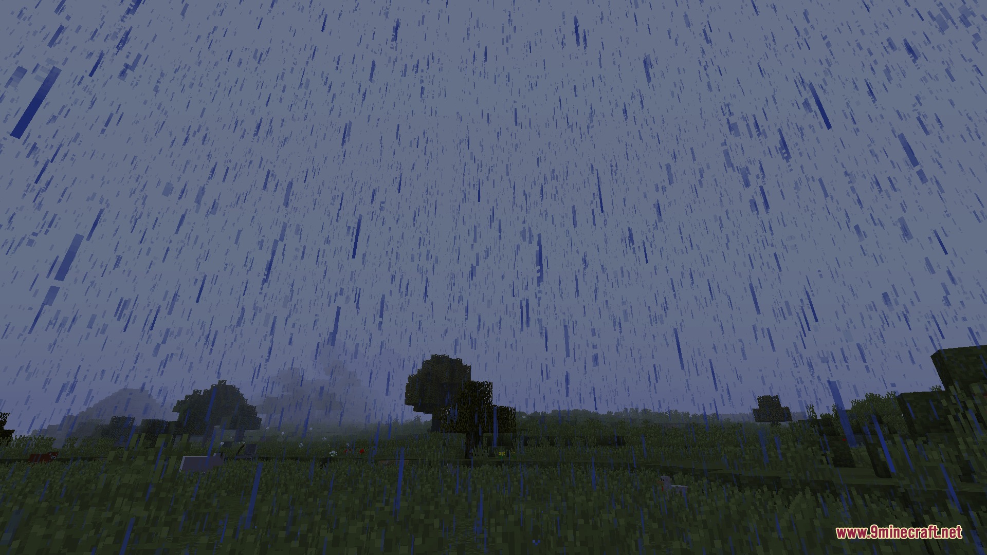 Erratic Skies Mod Screenshot 1 Heavy rain falls over a dark Minecraft landscape with trees and grass