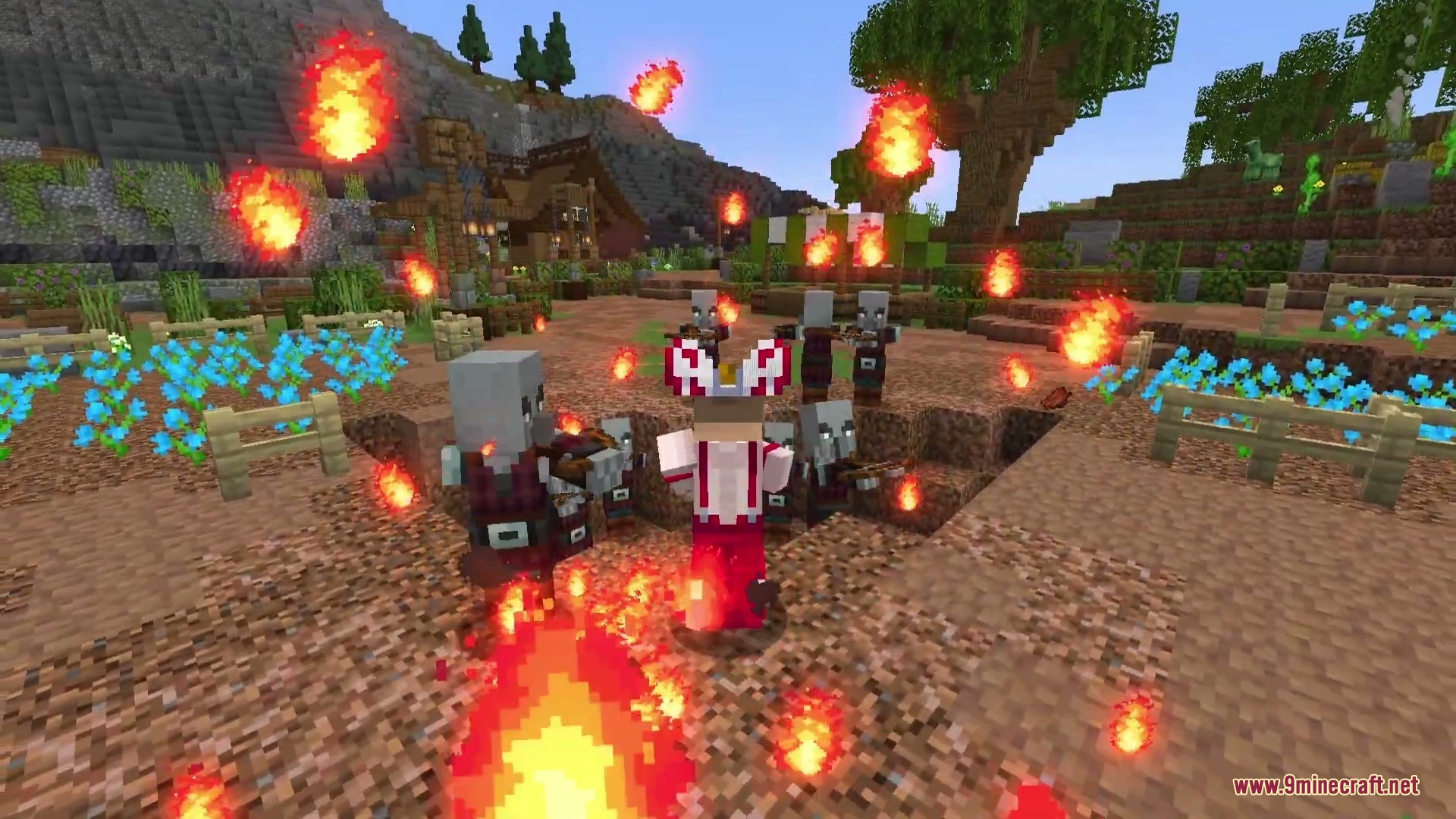 Player using the Phoenix technique to fight pillagers with floating fireballs